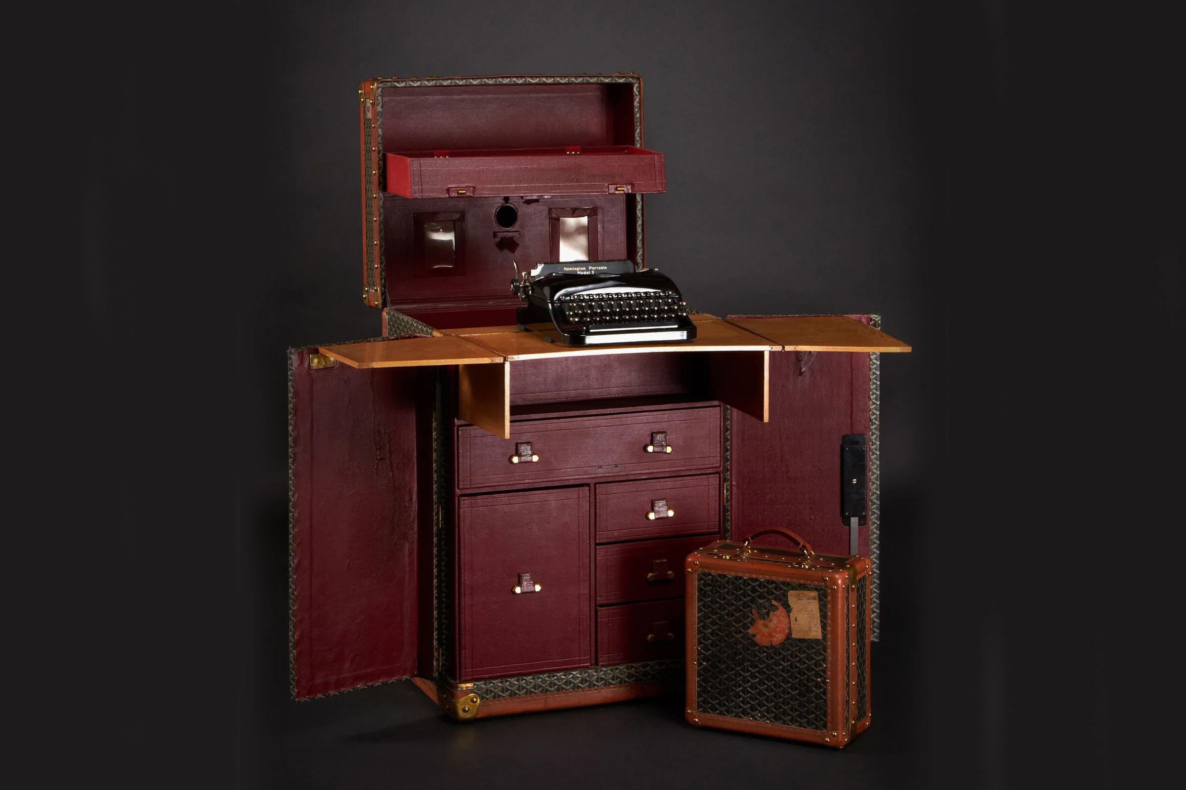 Sir Arthur Conan Doyle's custom Goyard trunk, which expands from a standard travel trunk into a full-size desk