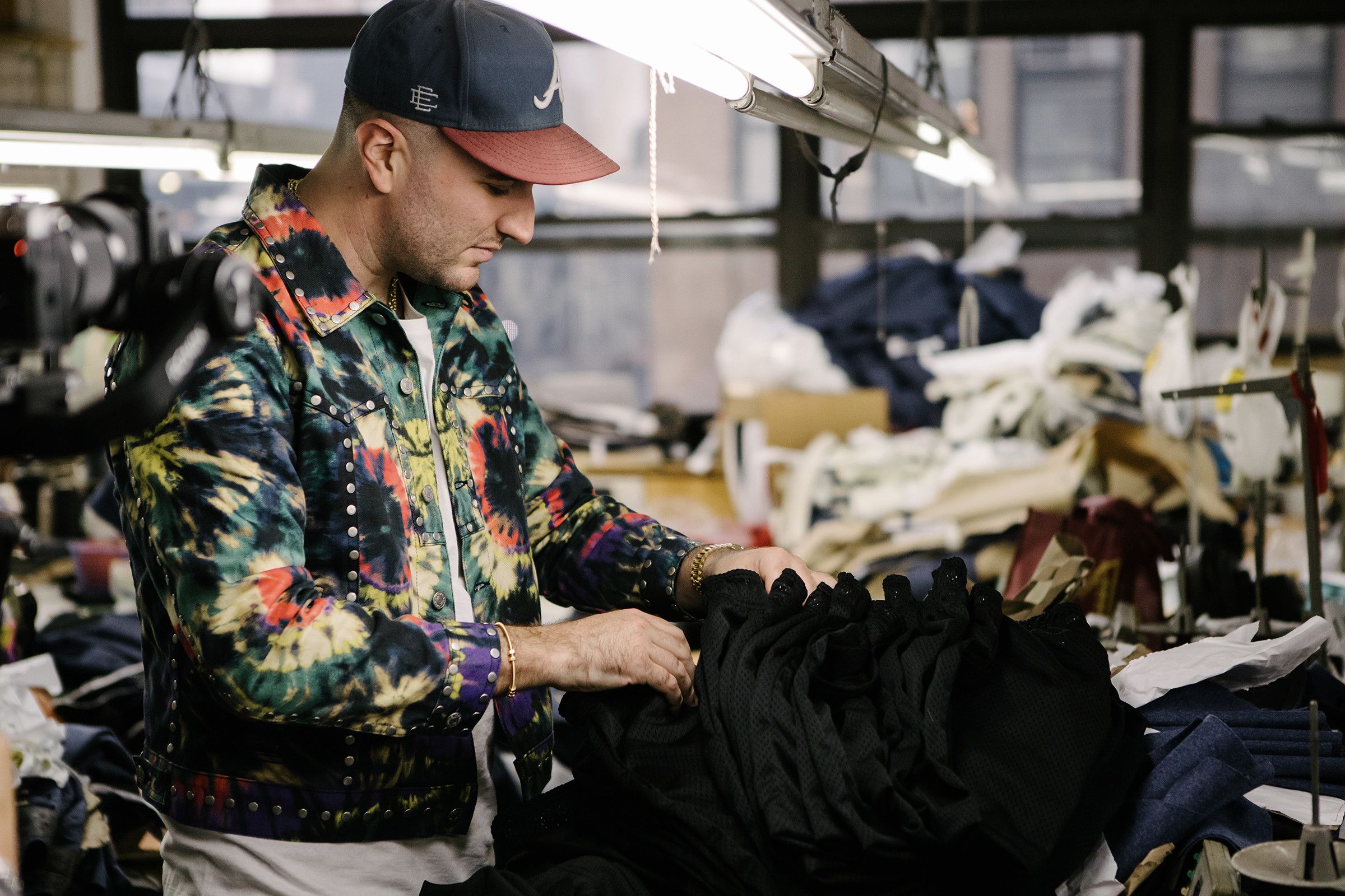 Eric Emanuel looking through product at the factory in New York City