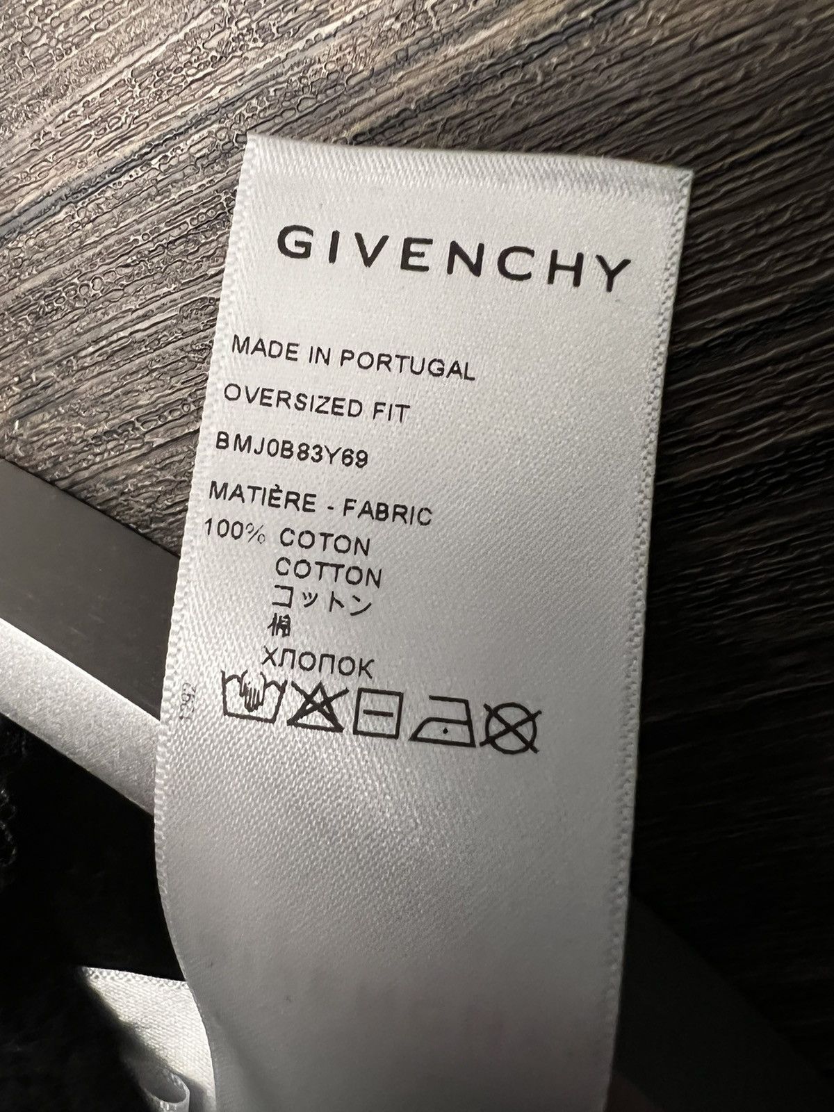 Givenchy Givenchy “Oversized” logo-print eyelet-detailing sweatshirt Size US S / EU 44-46 / 1 - 10 Thumbnail