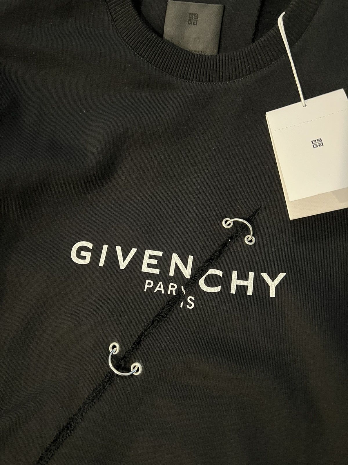 Givenchy Givenchy “Oversized” logo-print eyelet-detailing sweatshirt Size US S / EU 44-46 / 1 - 7 Thumbnail