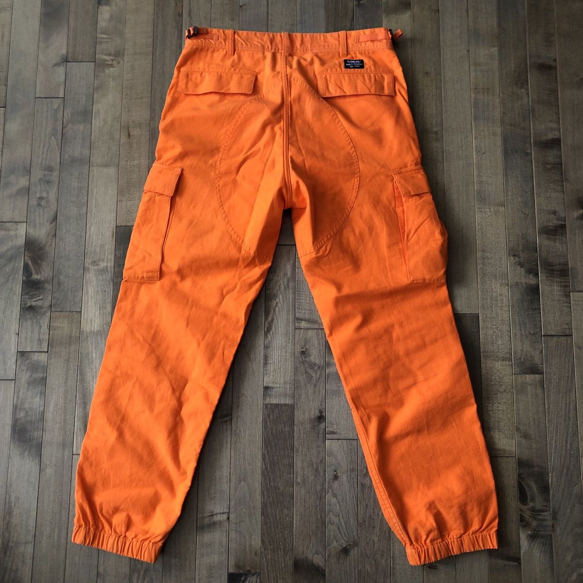 Supreme Supreme Orange Cargo Pants rare size small 30 Grailed