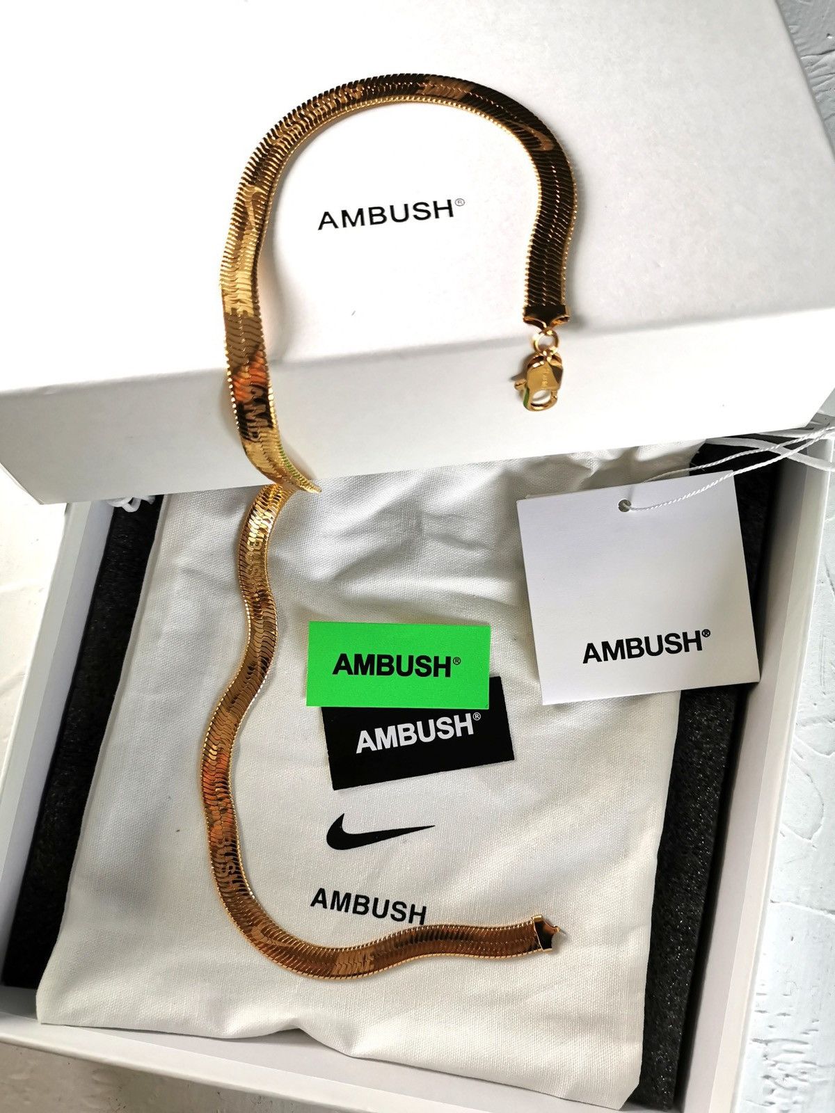 Nike ambush necklace deals