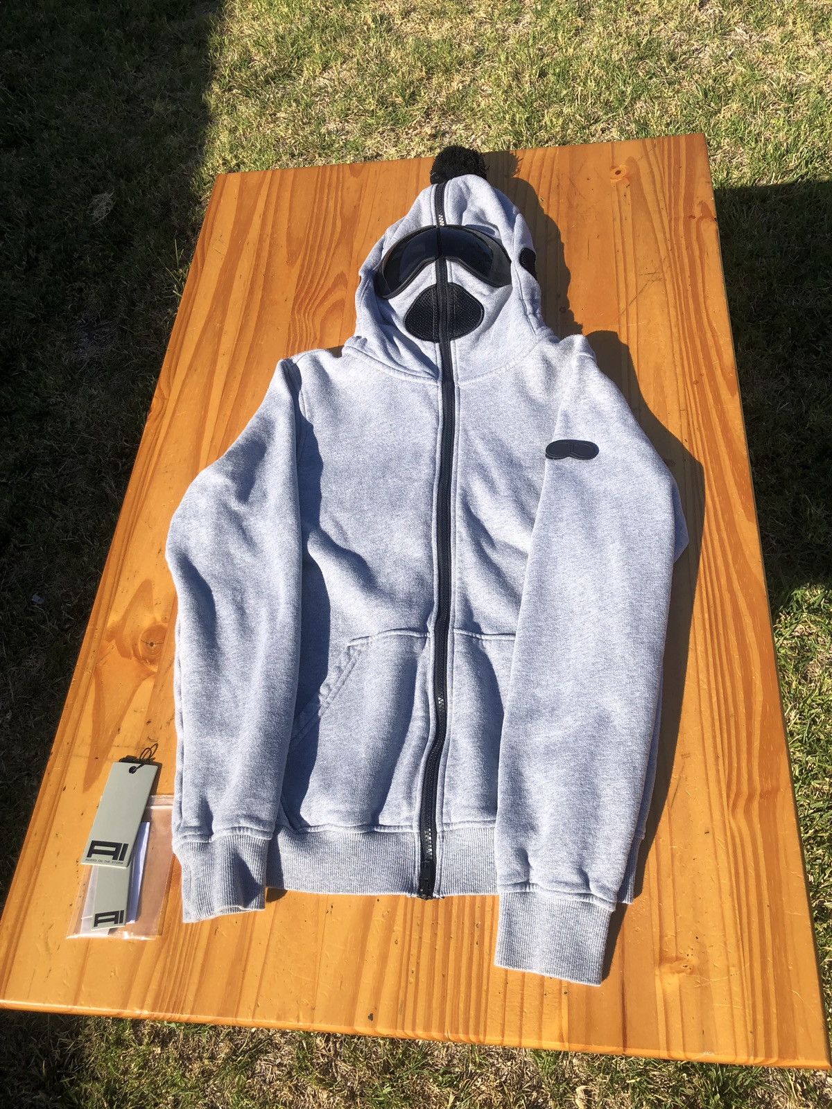トップス Supreme / NFL Raiders Hooded Sweatshirt Farfetch oakland raiders supreme store hoodie