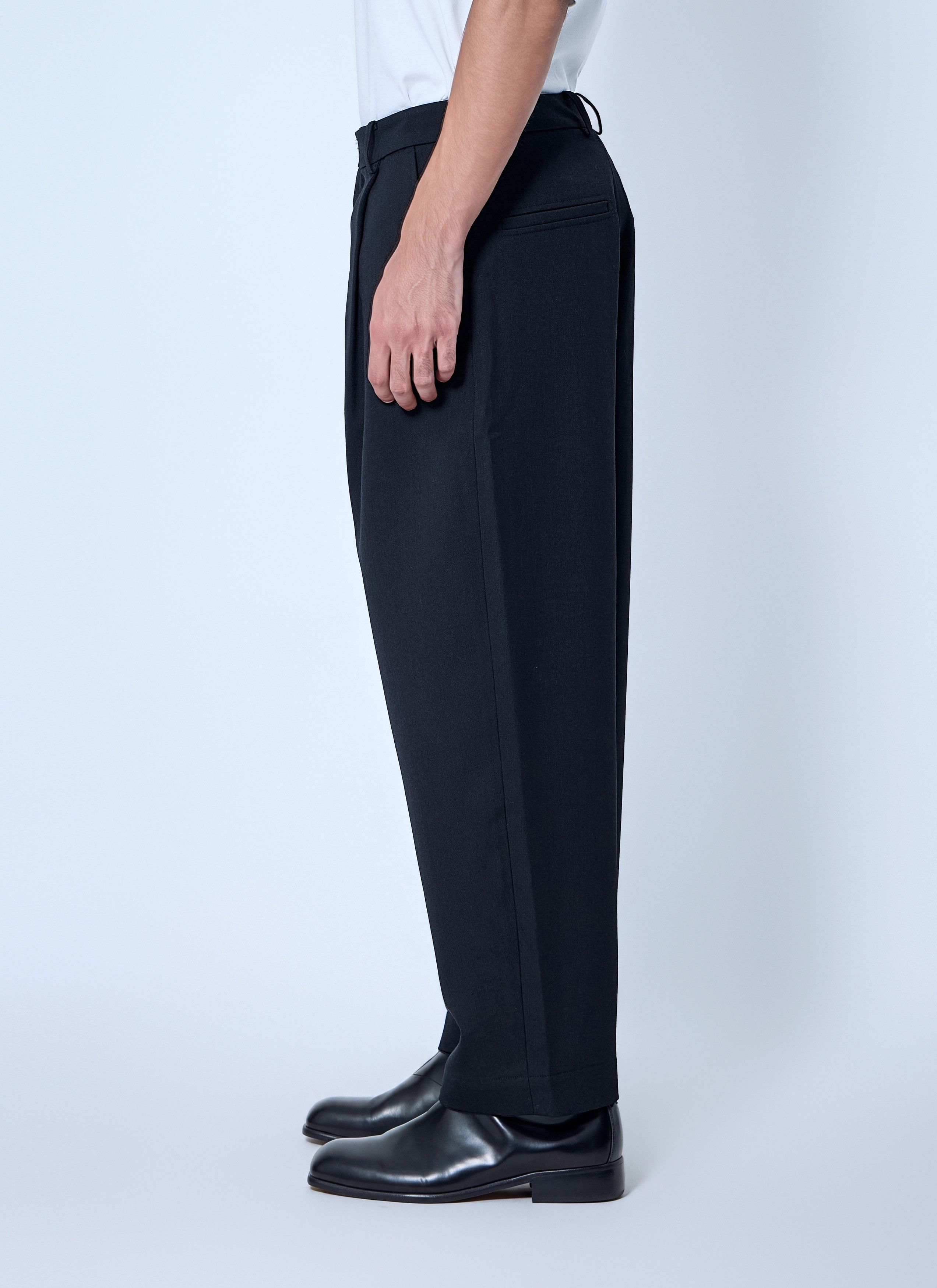 Studio Nicholson Tuck Cotton Tapered Leg Trousers in Black, Men's (Size 32) — image 3 of 6