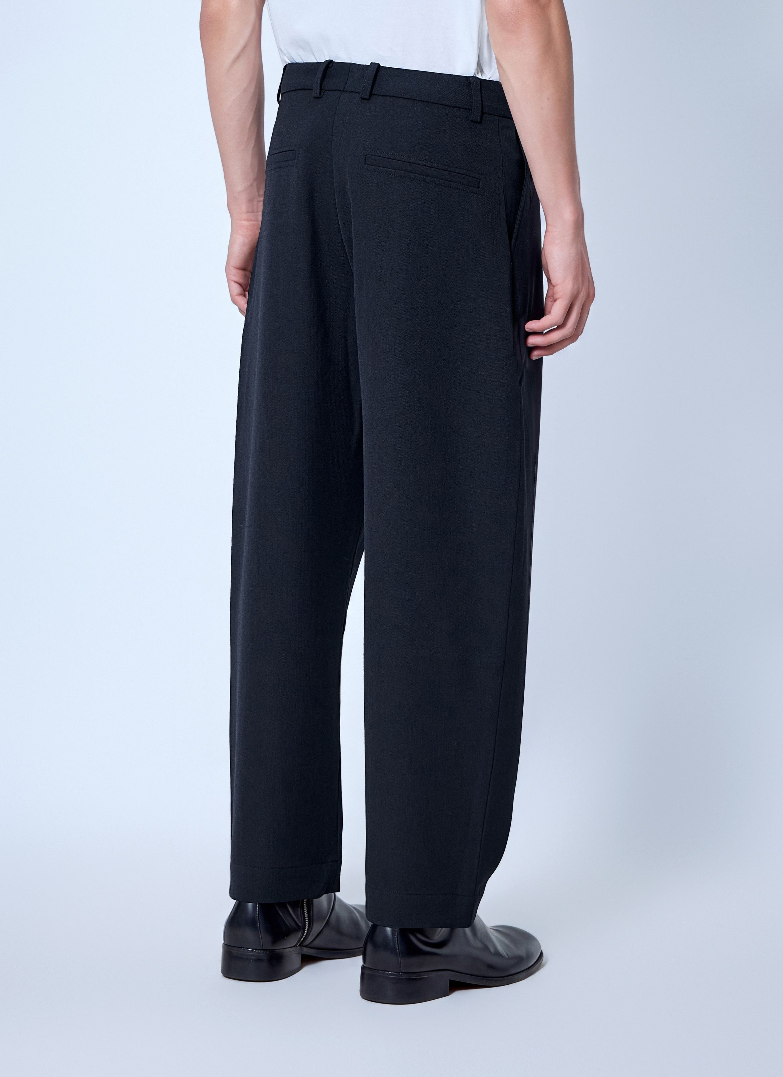Studio Nicholson Tuck Cotton Tapered Leg Trousers in Black, Men's (Size 34) — image 4 of 6