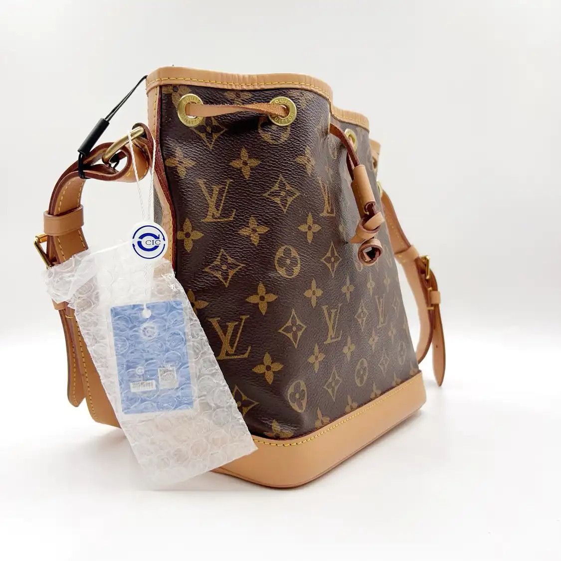 Louis Vuitton LOUIS VUITTON NOé BB brown coated canvas monogram bucket bag crossbody bag gold Size ONE SIZE - 5 Thumbnail