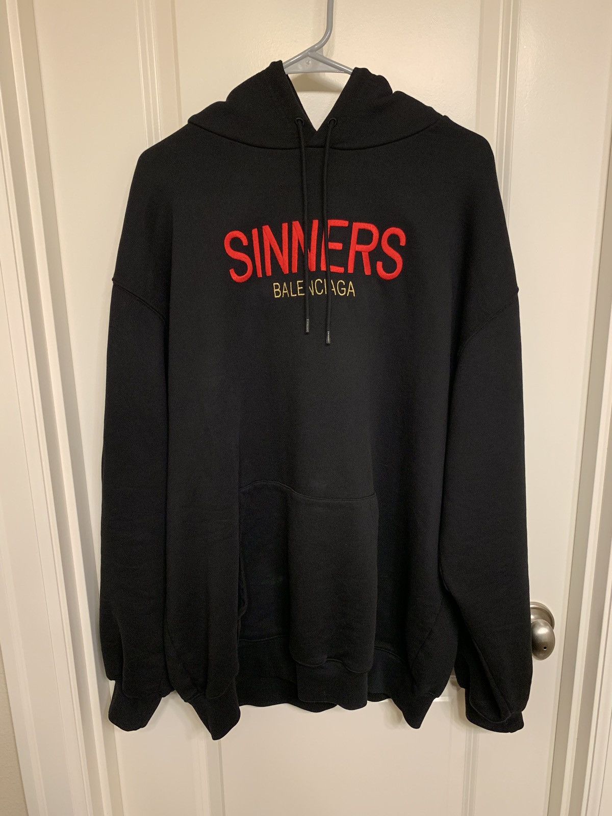 Balenciaga sinners hot sale hoodie fake