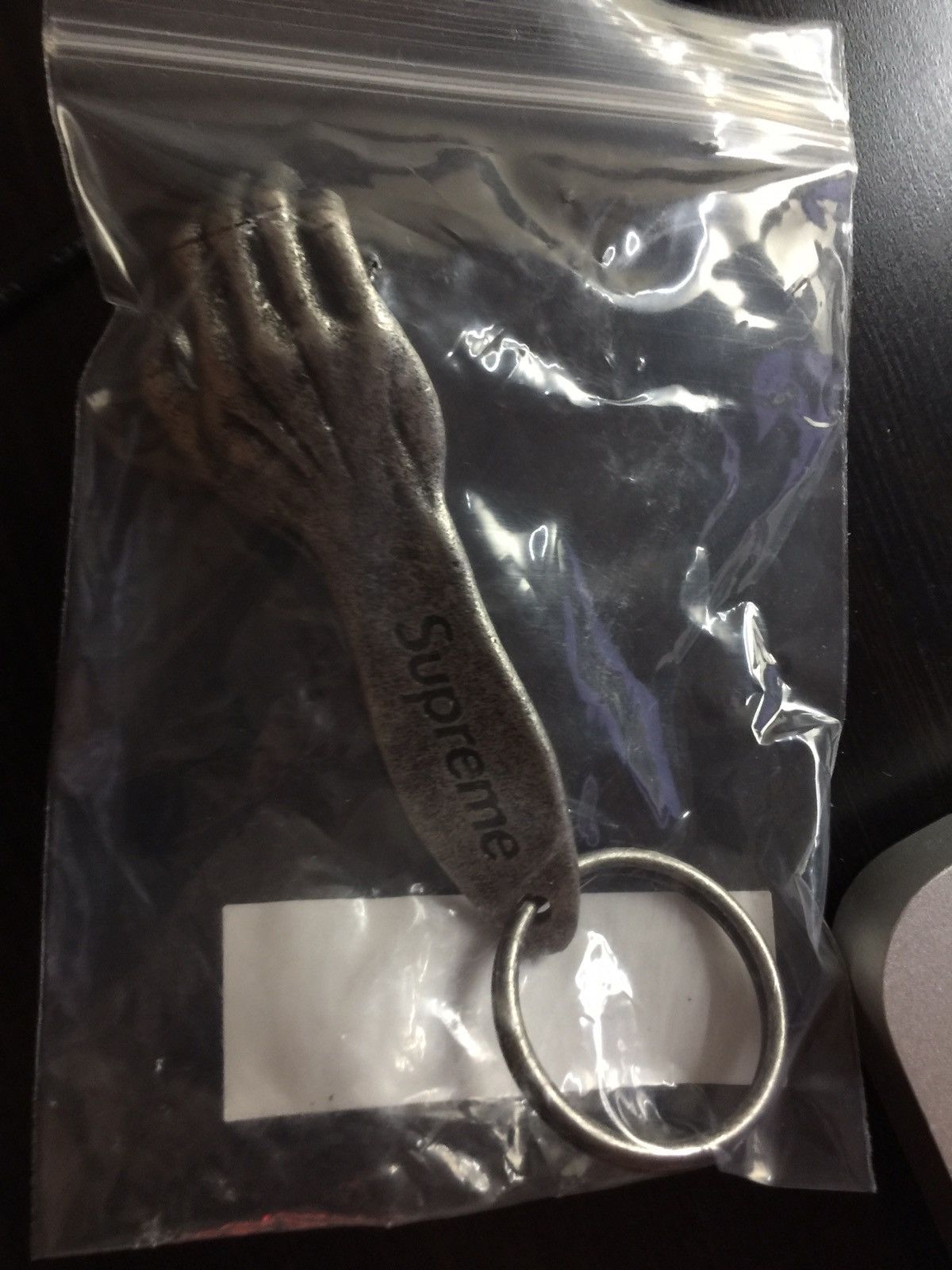 Supreme hand sales bottle opener