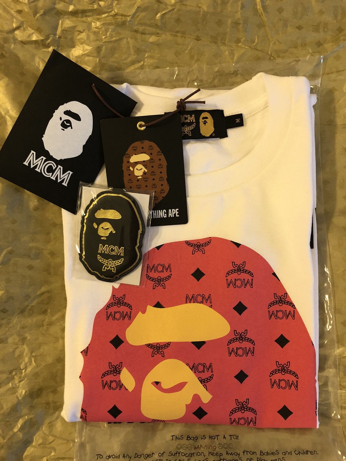 Bape × MCM Bape x MCM pink camo ape head tee | Grailed