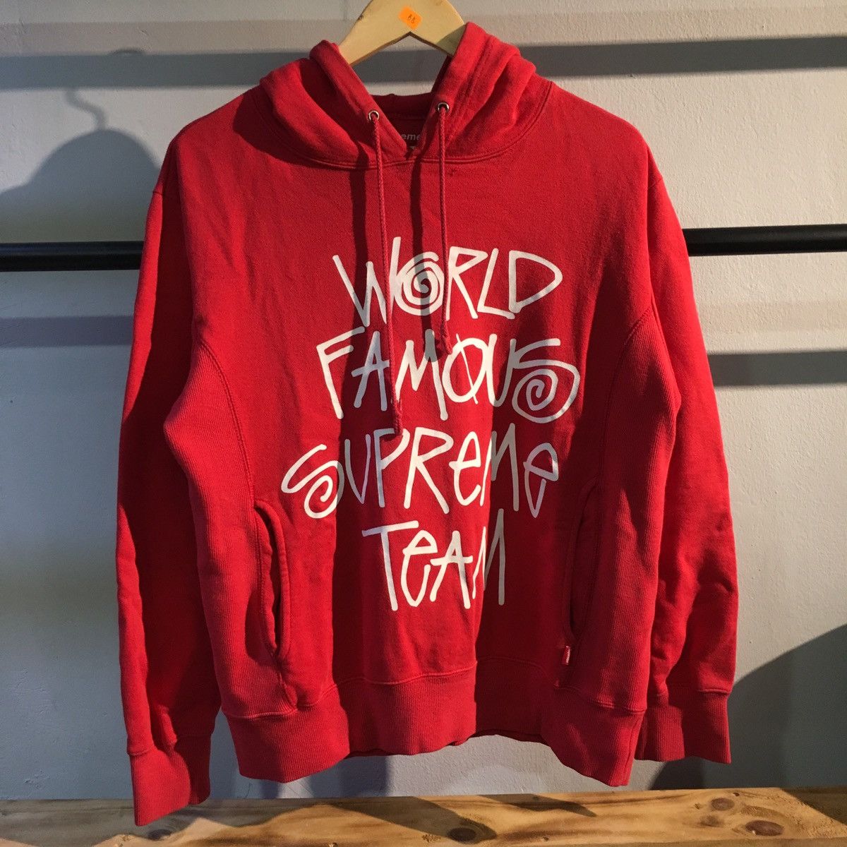 Supreme Supreme World Famous Supreme Team Hoodie | Grailed