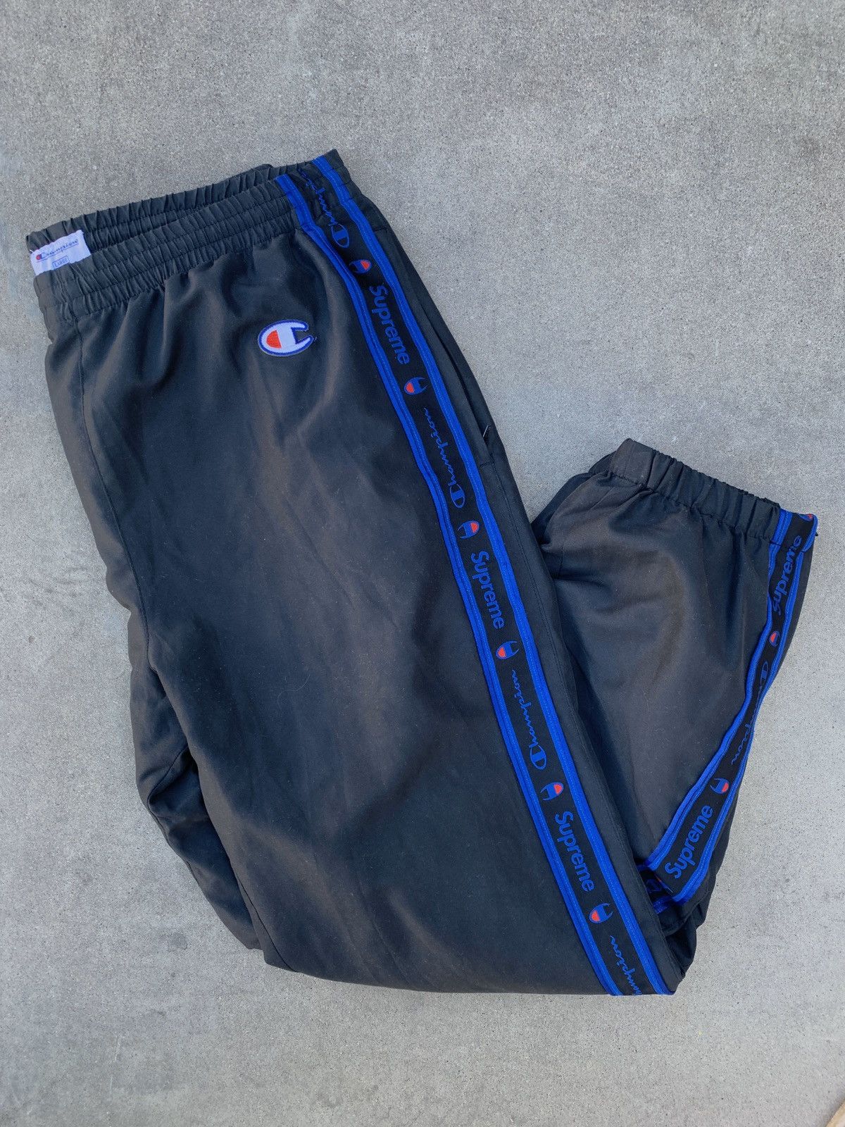 Supreme Supreme champion FW14 track pants | Grailed