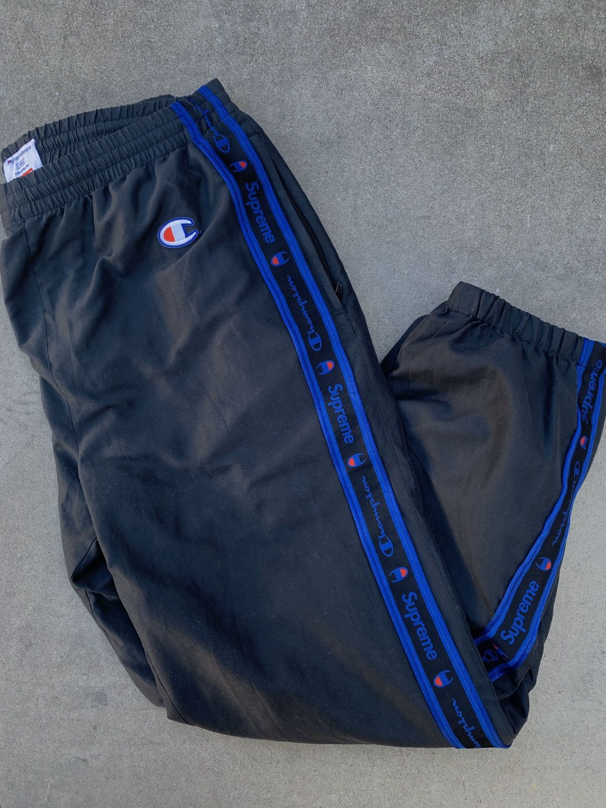 Supreme Supreme champion FW14 track pants | Grailed