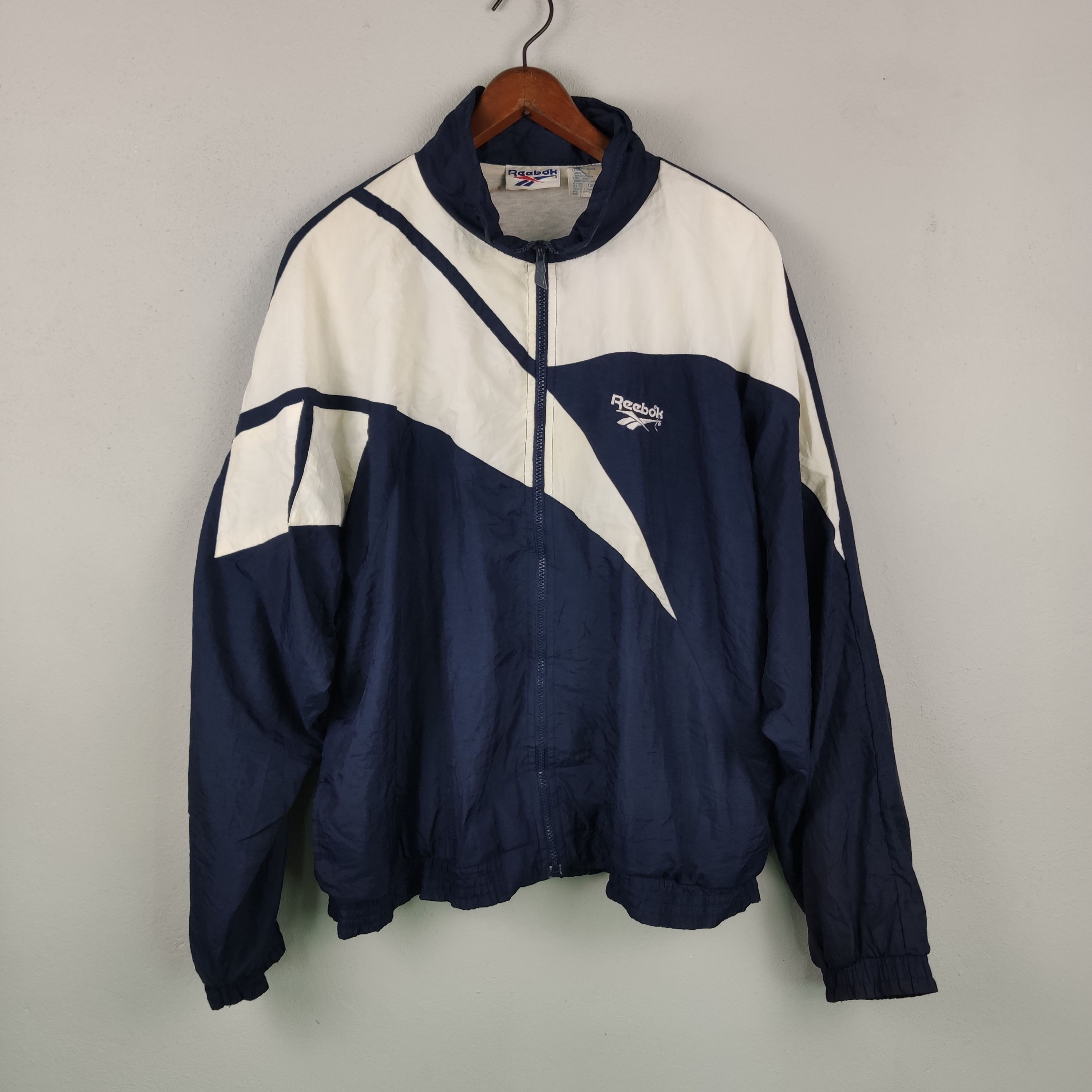 Vintage VINTAGE 90S REEBOK BIG LOGO DESIGN WINDBREAKER JACKET | Grailed