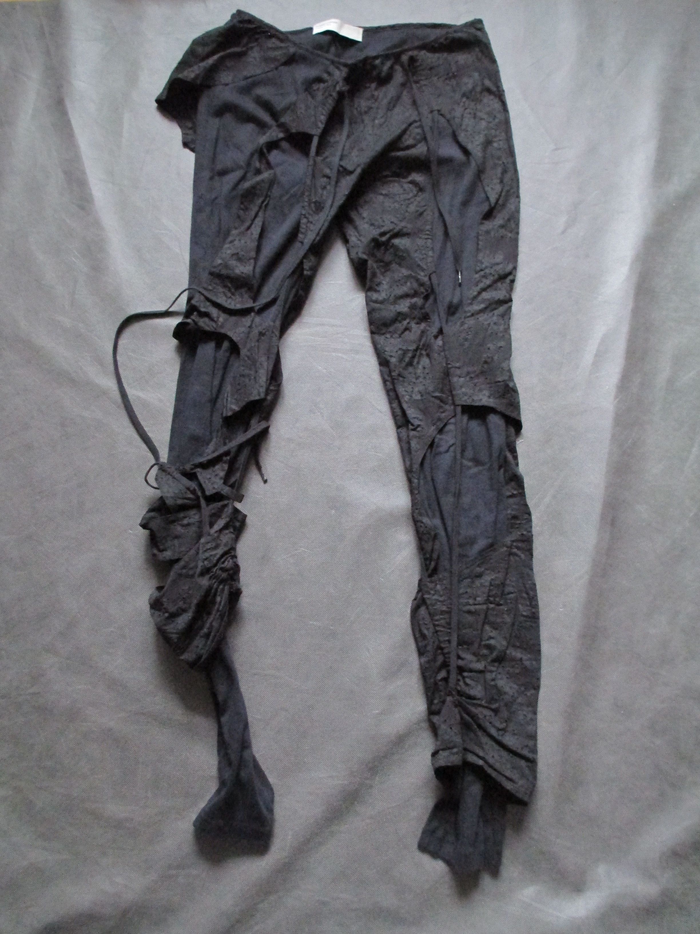 Hussein Chalayan deconstructed bondage pierced pants | Grailed