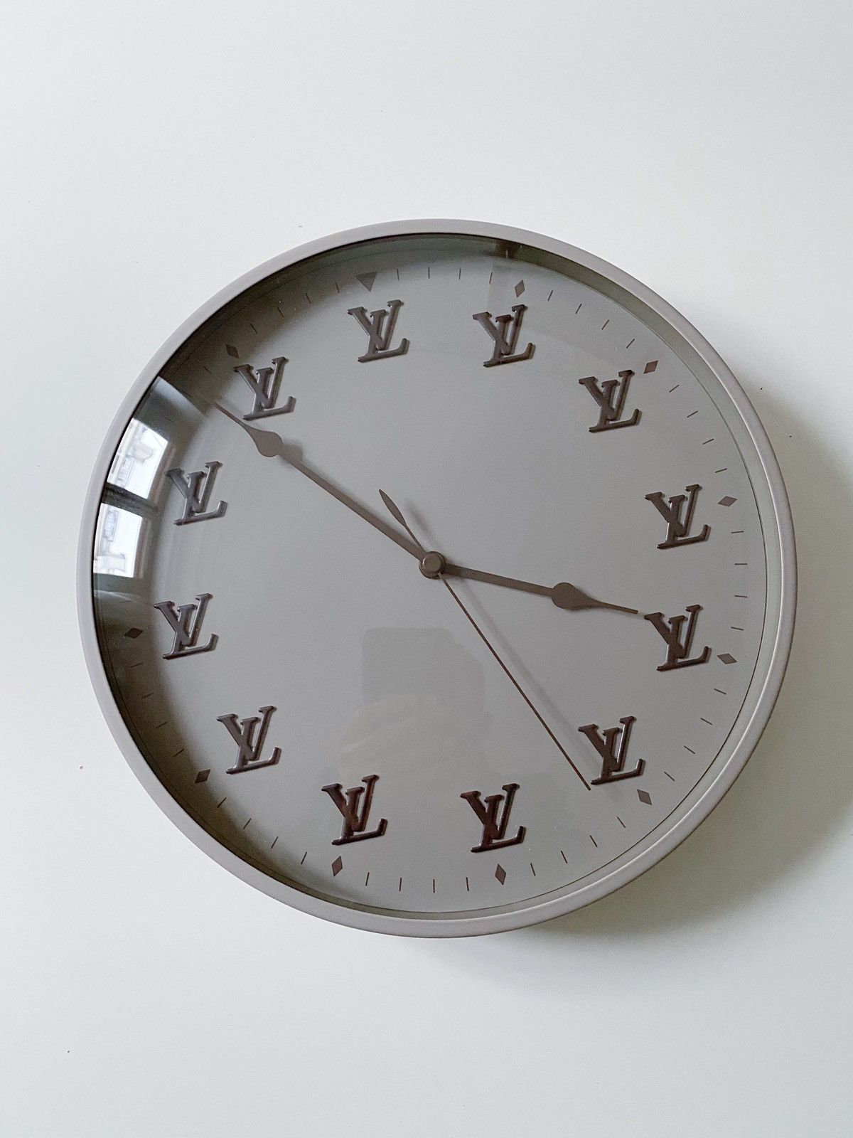 Virgil Abloh Plays With Time With Louis Vuitton Backwards Clock Invitation