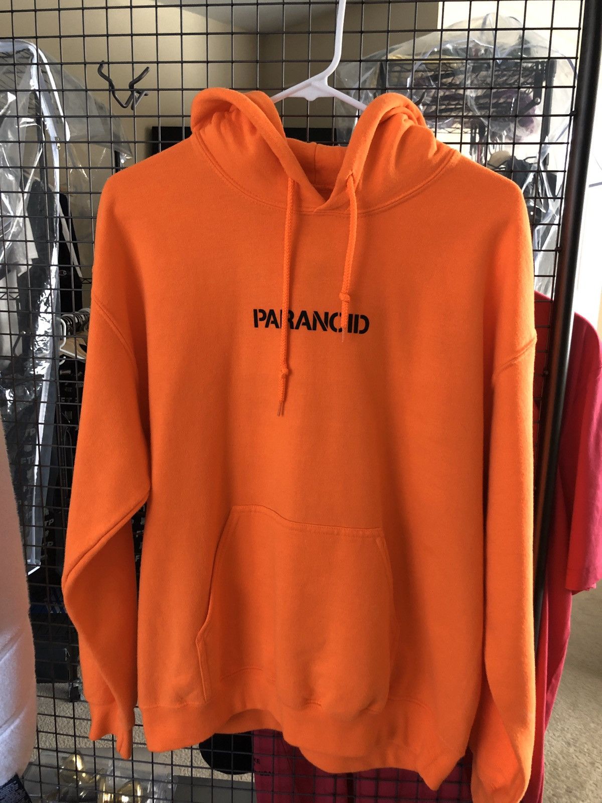 Anti social social club x undefeated paranoid best sale hoodie orange