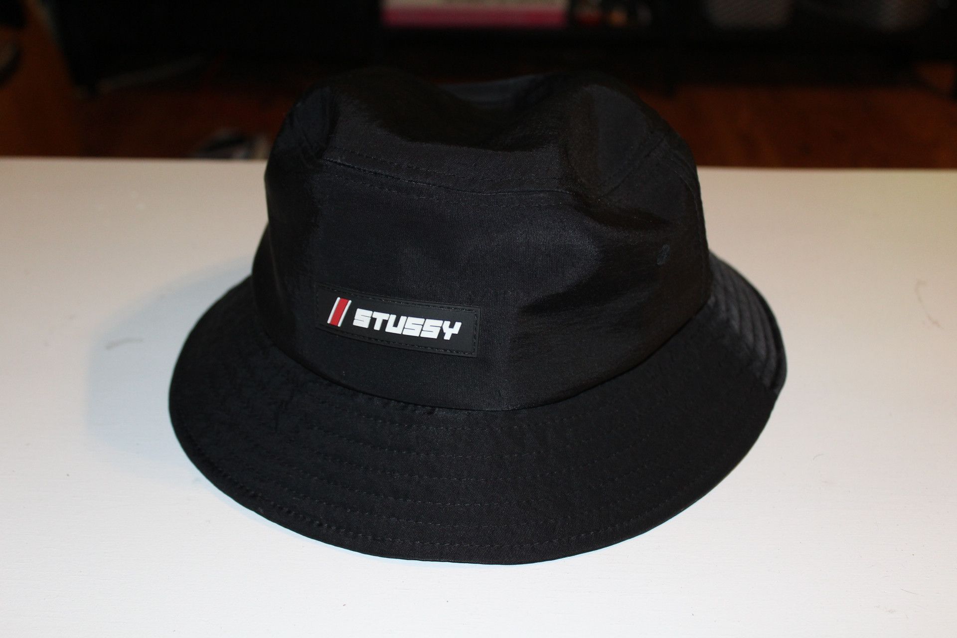 Stussy Stussy Prada Logo Rip Nylon Bucket Hat | Grailed