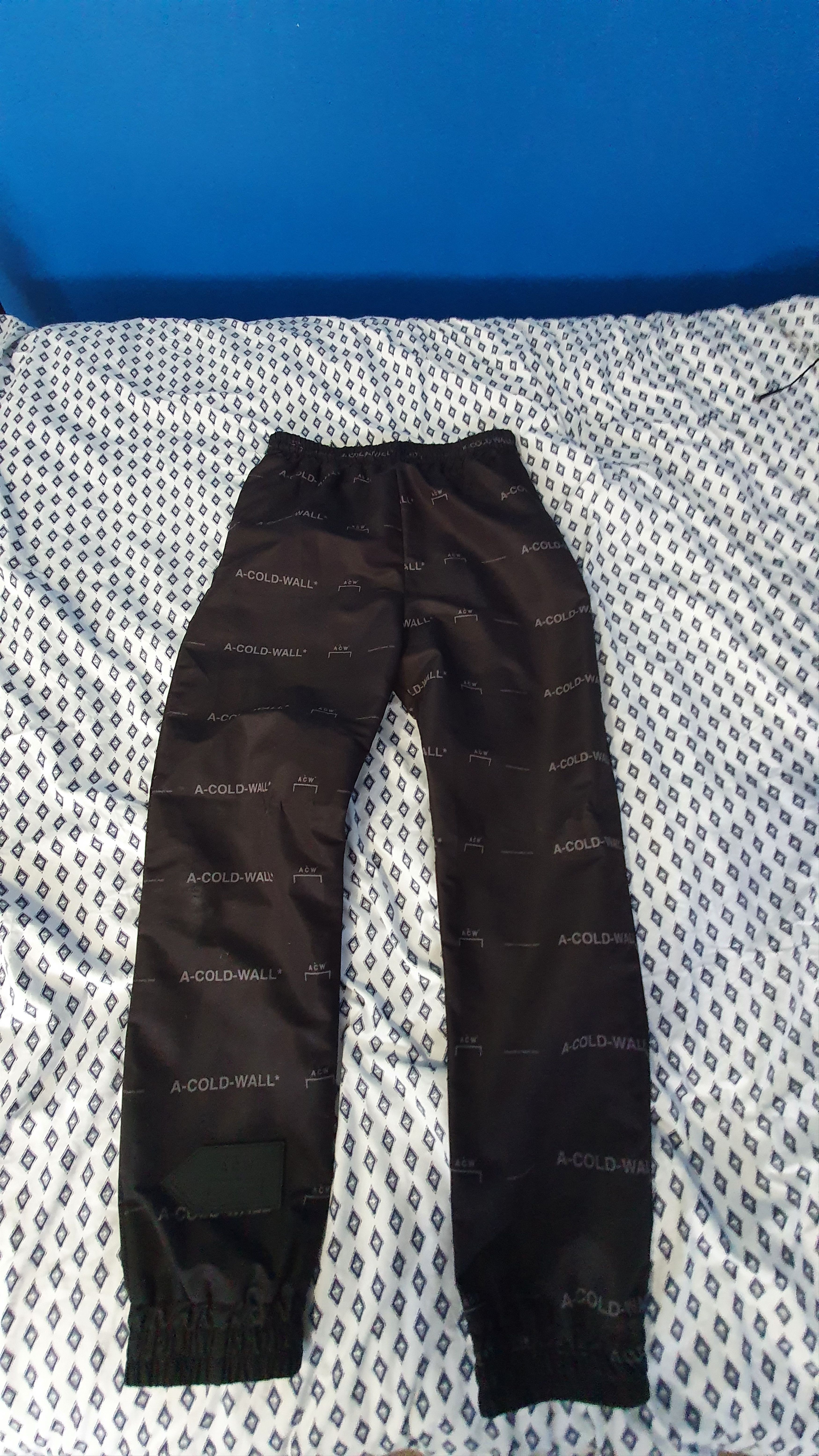 image of A Cold Wall Acw All Print Trackies in Black, Men's (Size 32)