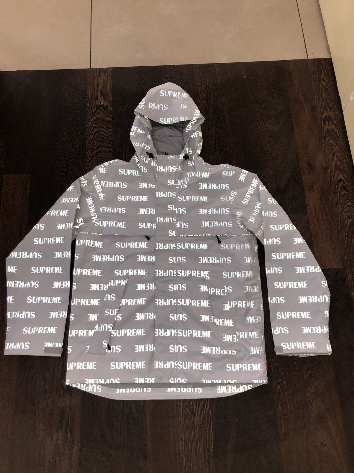 Supreme Supreme 3M Reflective Repeat Rain Jacket White | Grailed