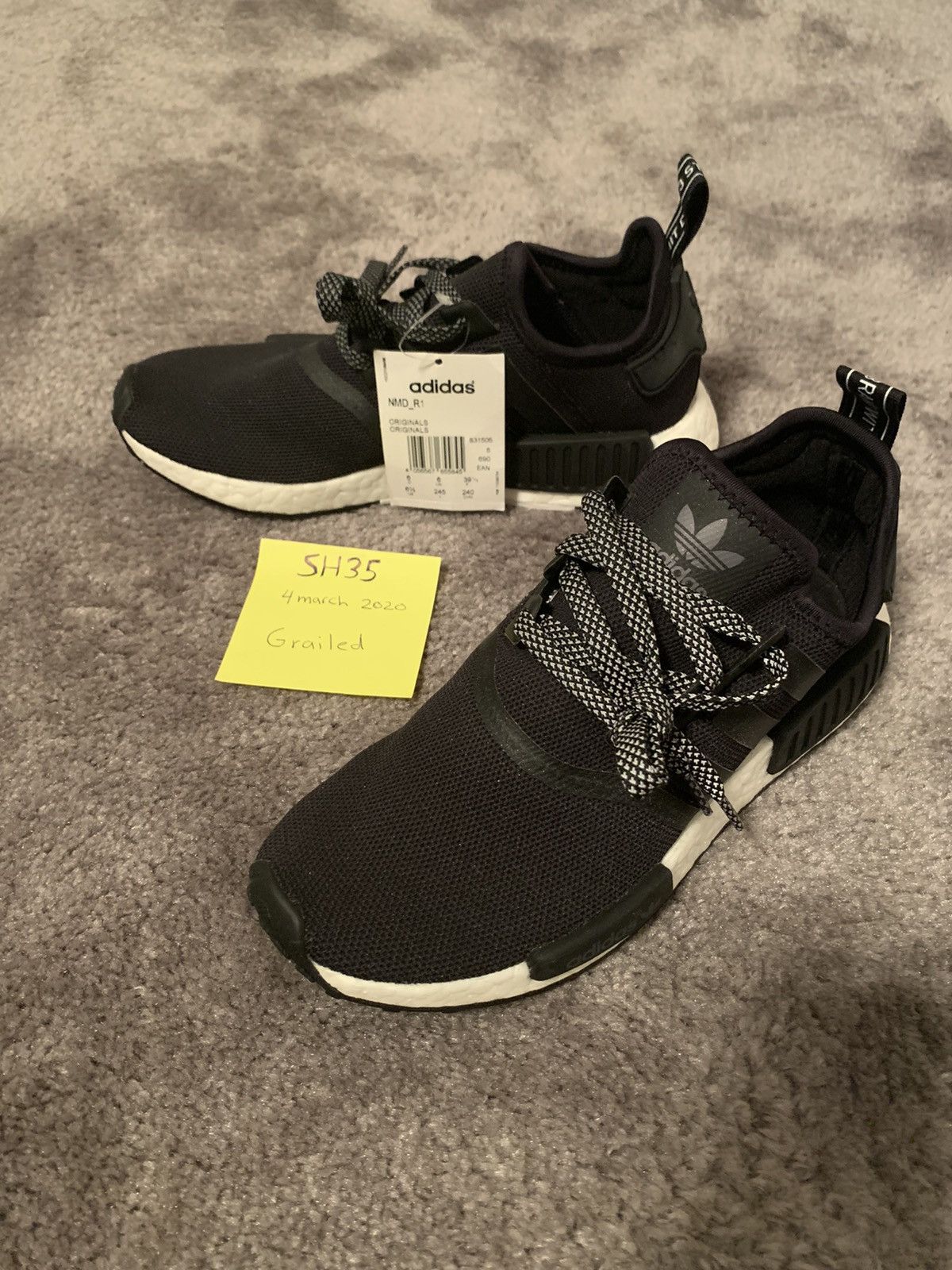 Nmd r1 black reflective deals
