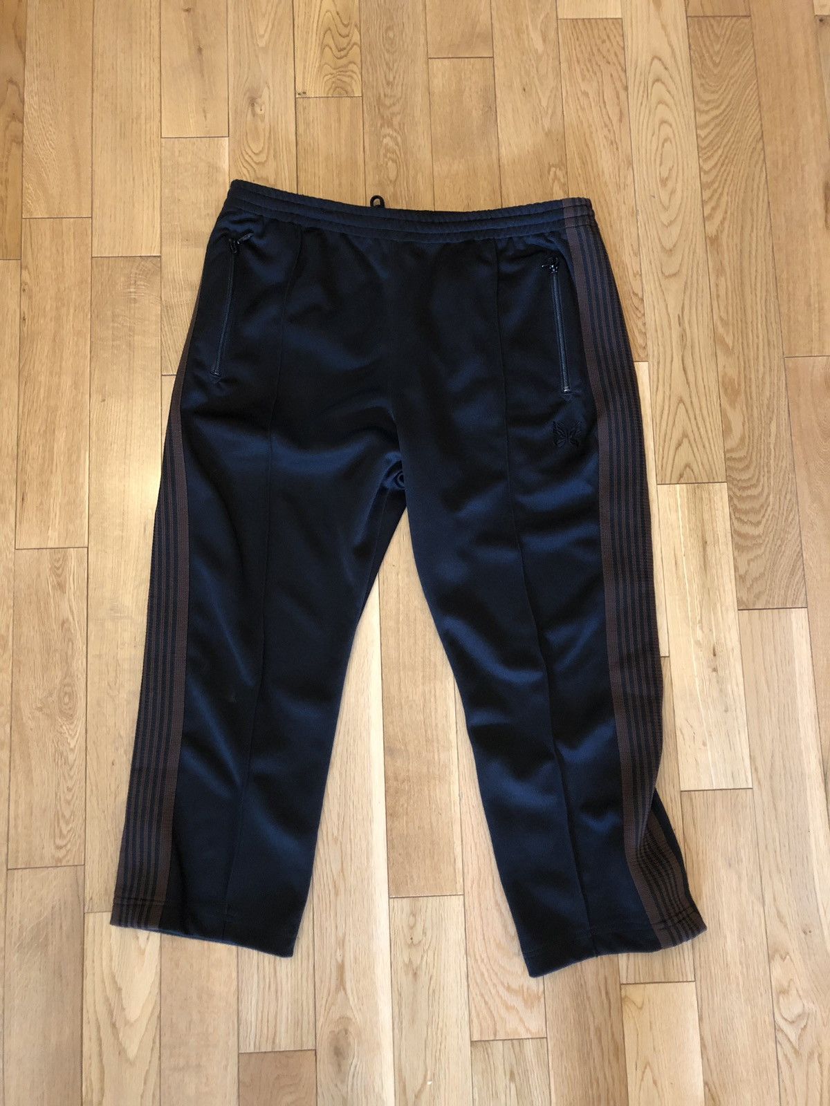 Needles Needles narrow track pants Black with brown stripe | Grailed