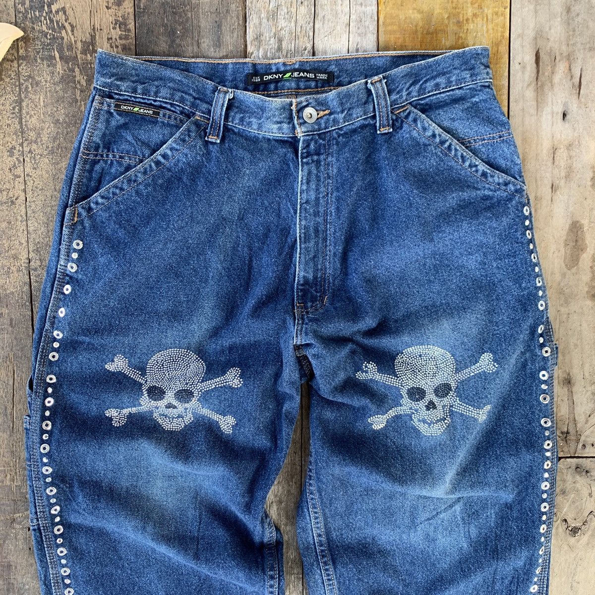 Dkny denim jeans with skull bead