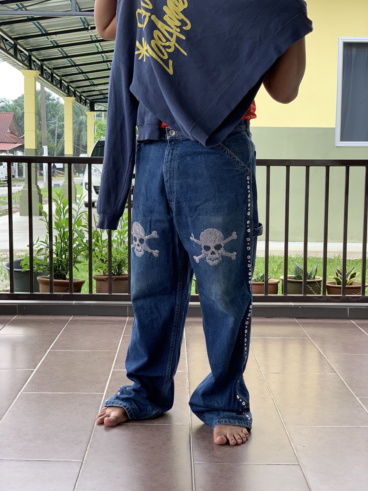 Dkny denim jeans with skull bead