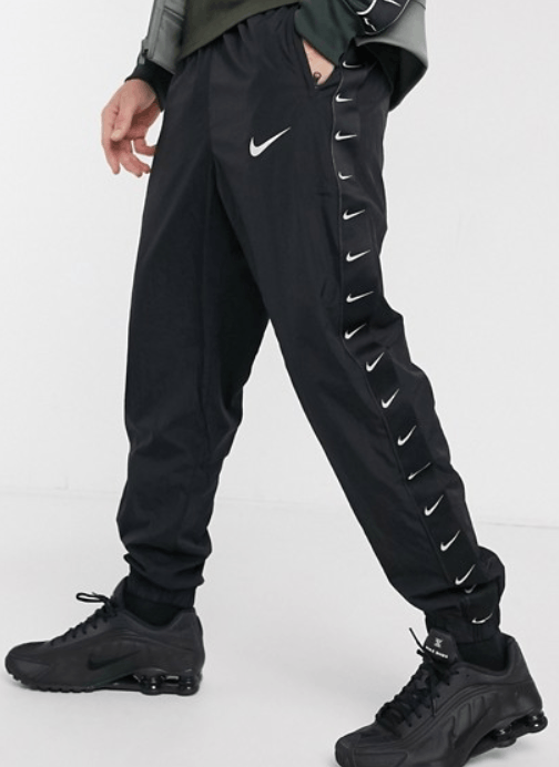 Nike taped pants black online