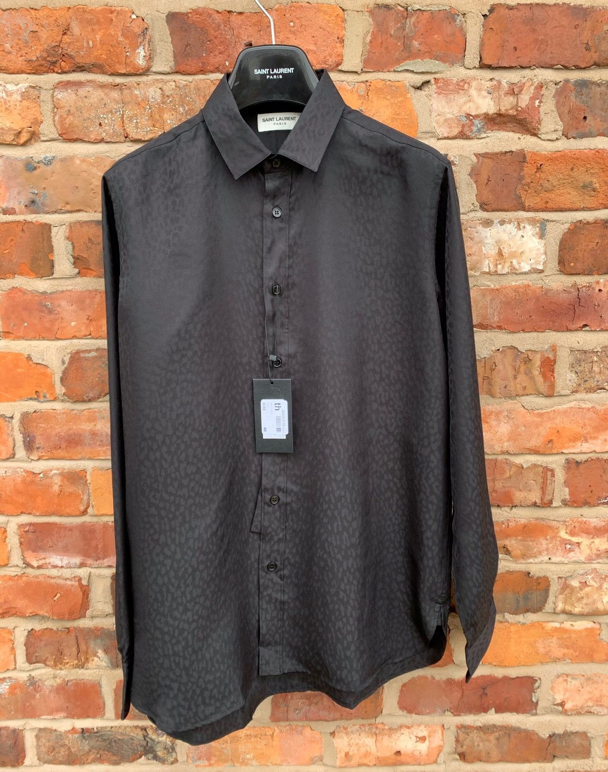 Saint laurent babycat shirt hotsell