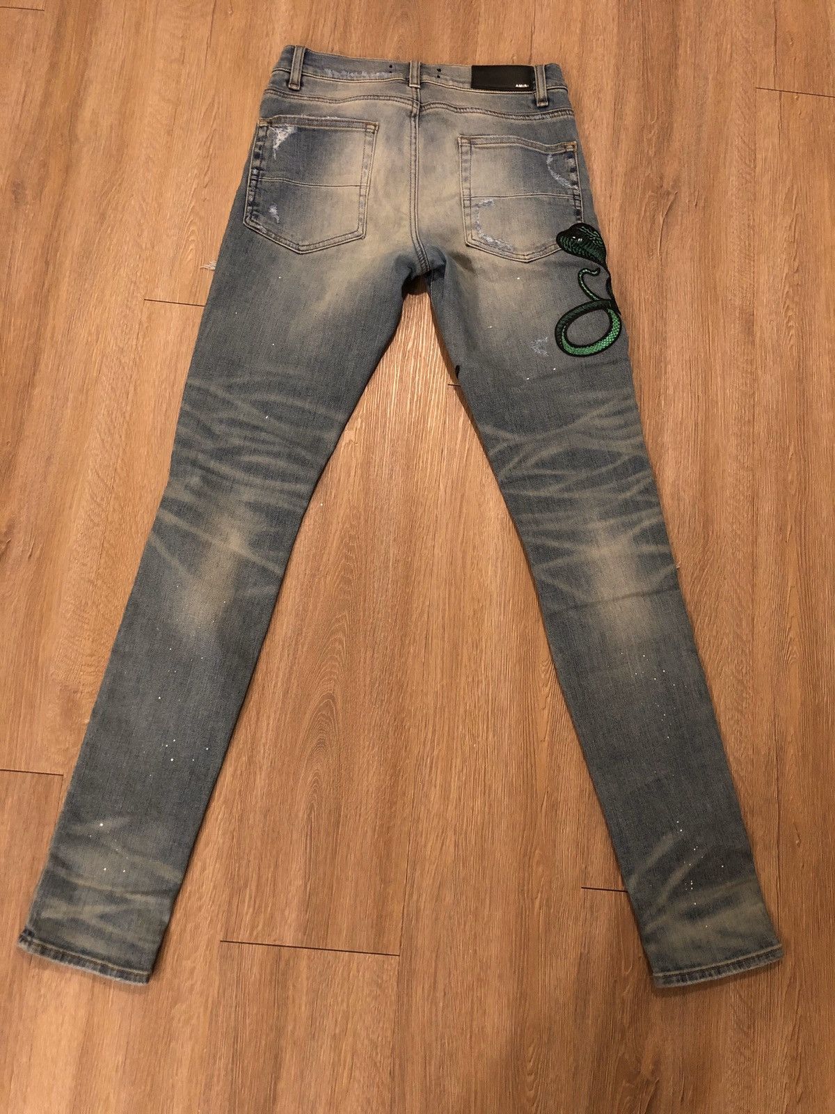 Amiri Snake art patch jeans | Grailed