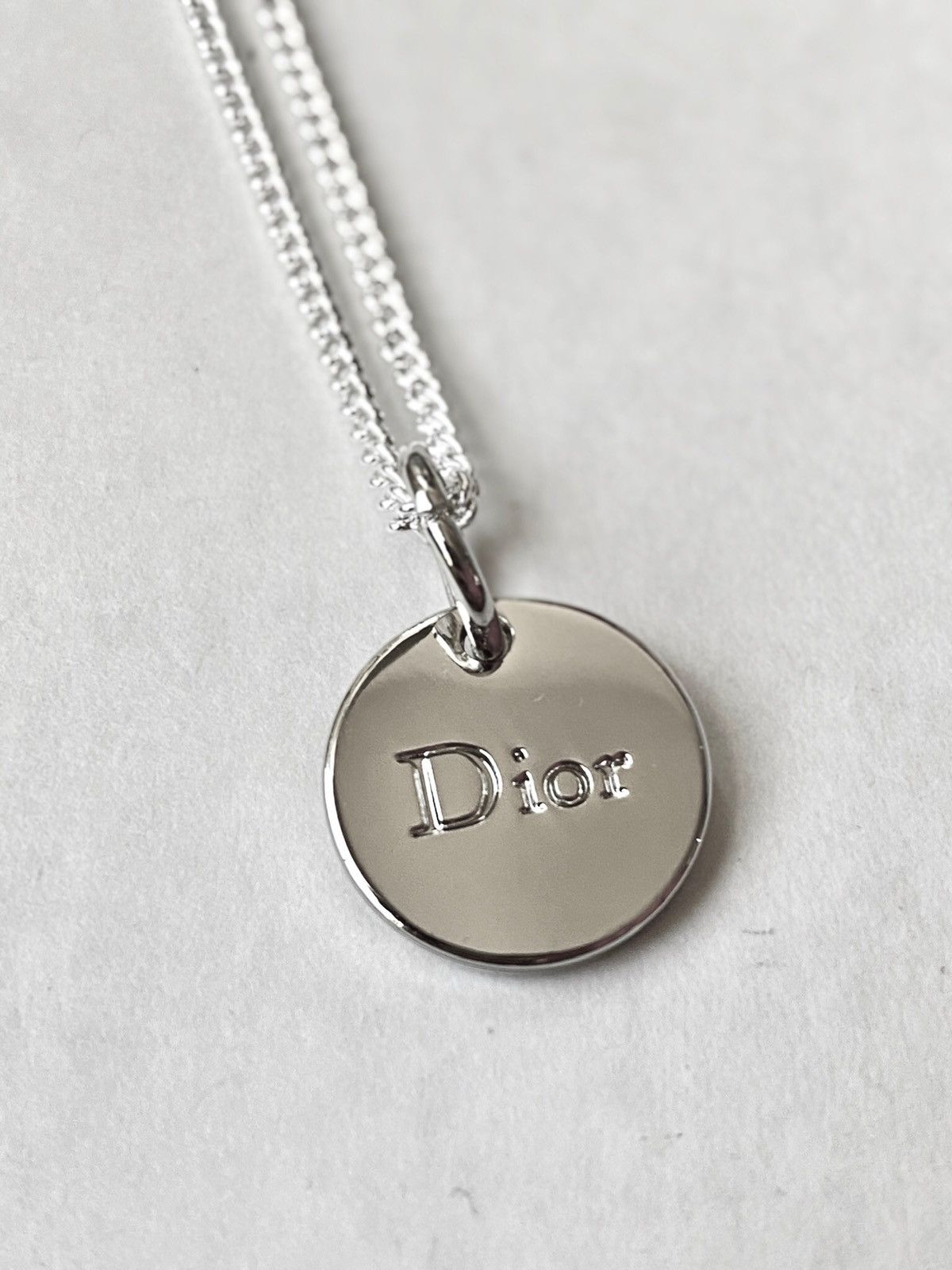 Dior “J'adore” Silver Circle Pendant on Chain/Necklace