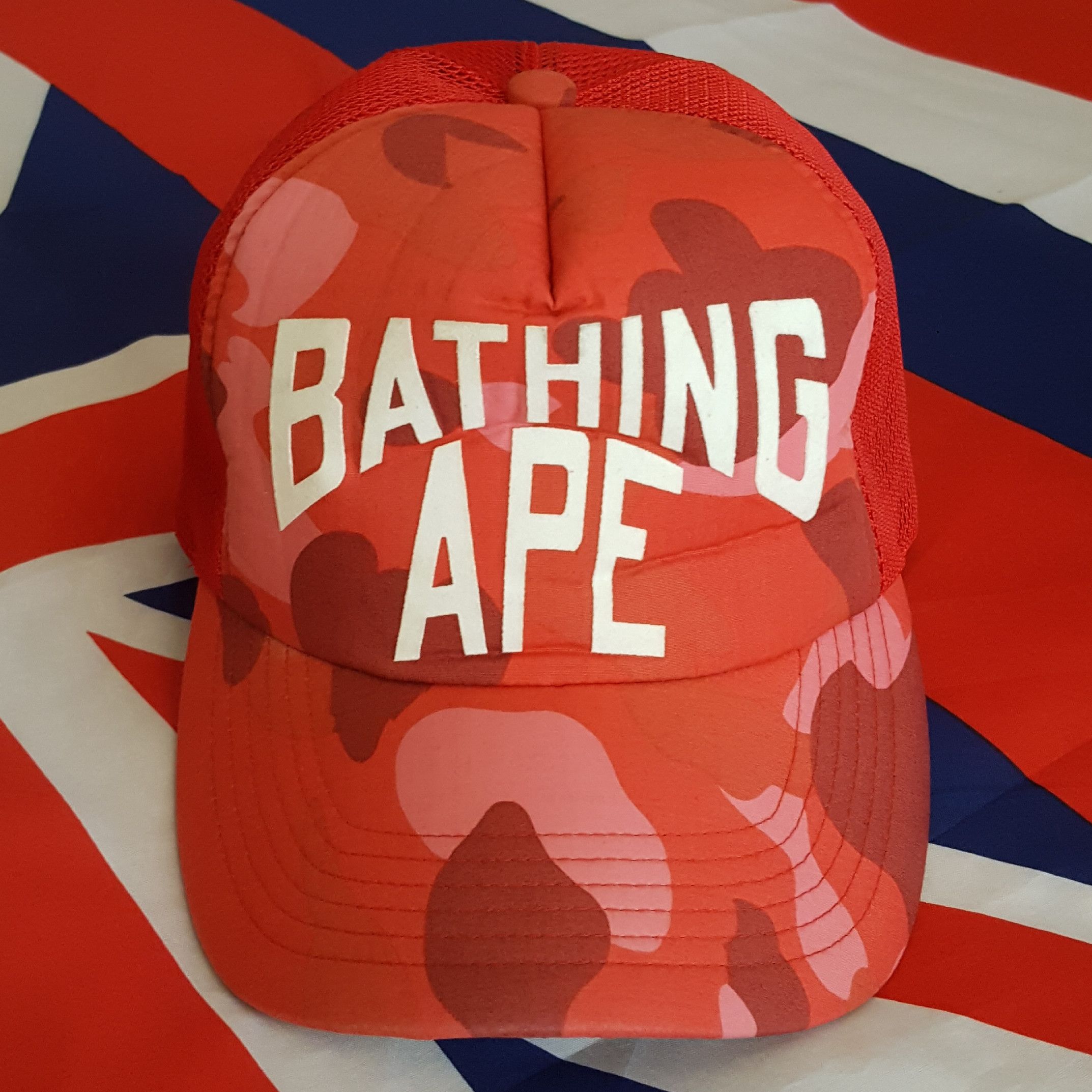 image of Bape Color Camo Nyc Logo Mesh Cap in Red, Men's