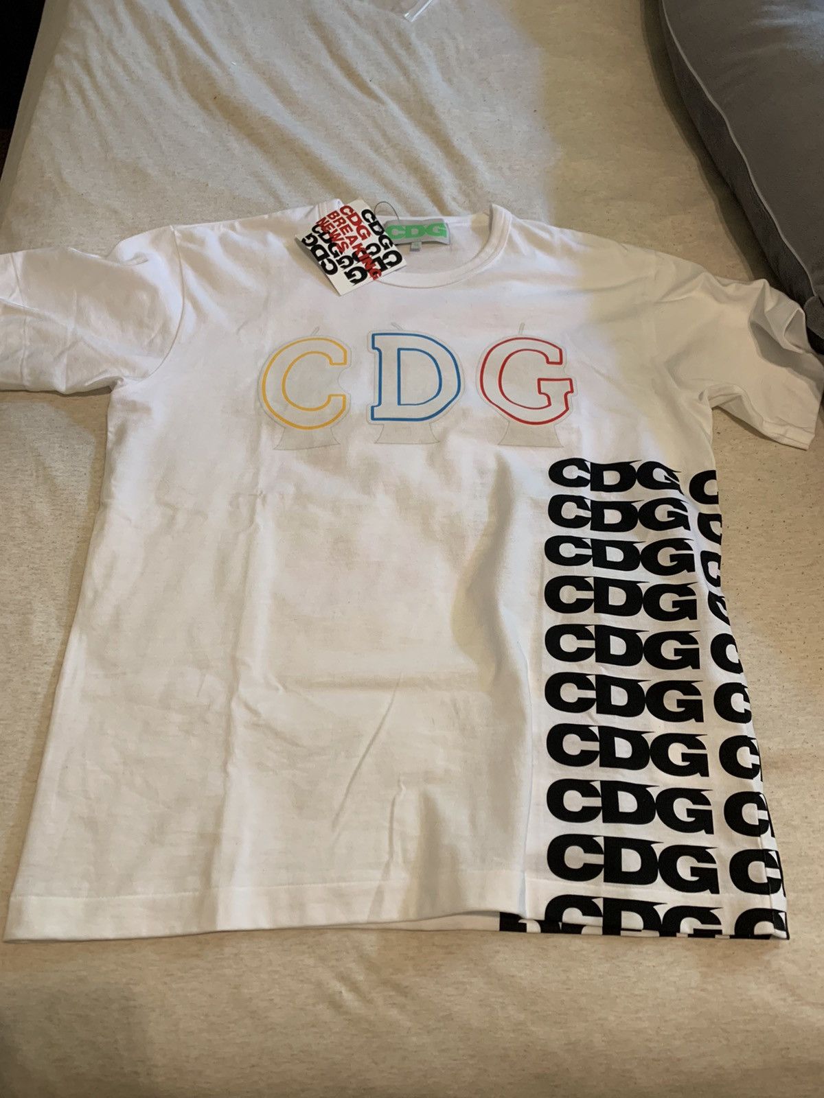 Comme des Garcons CDG Breaking News Collab tee ASSC T-shirt | Grailed