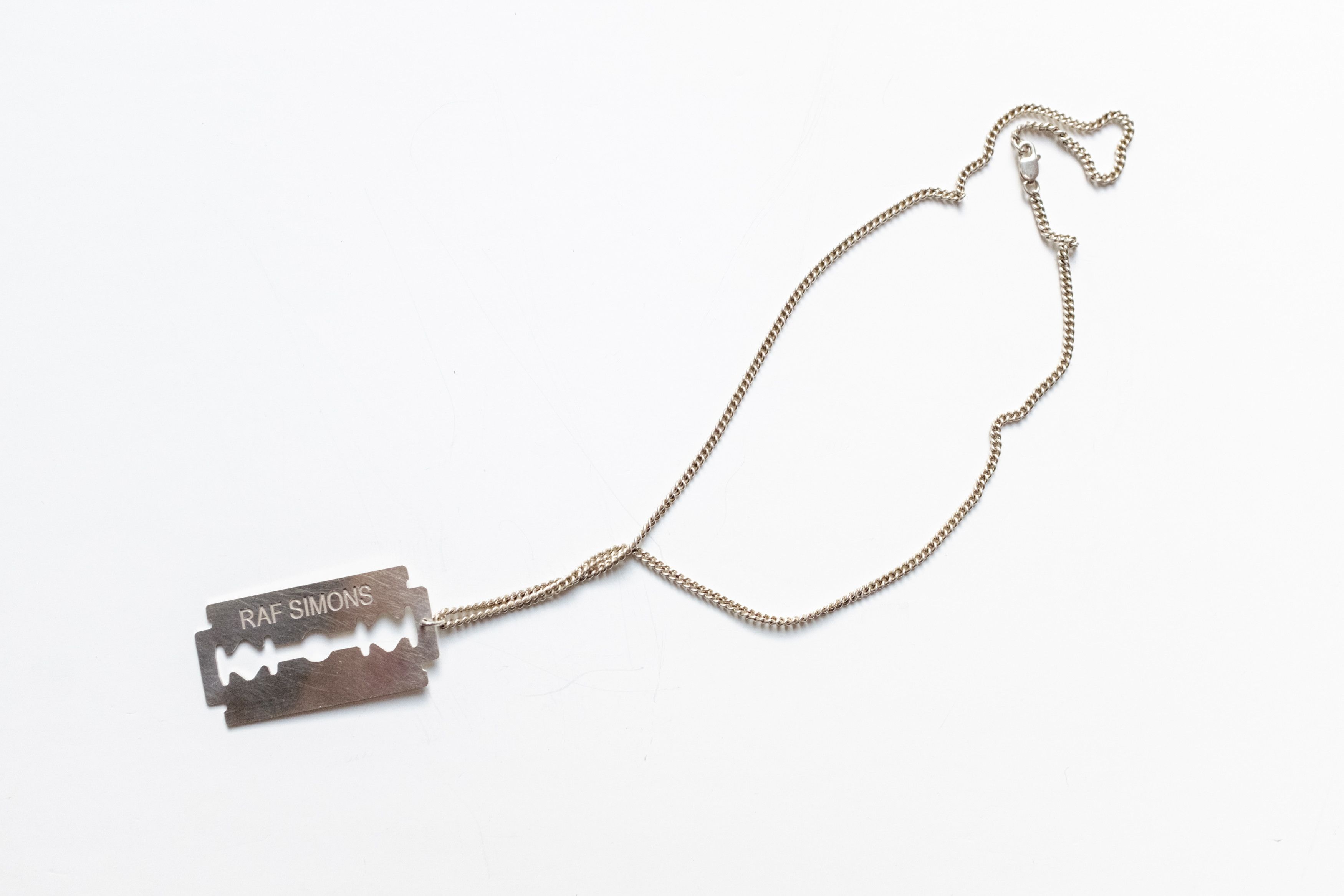 Raf Simons Silver Razor Blade necklace AW 2003/2004 Peter Saville | Grailed