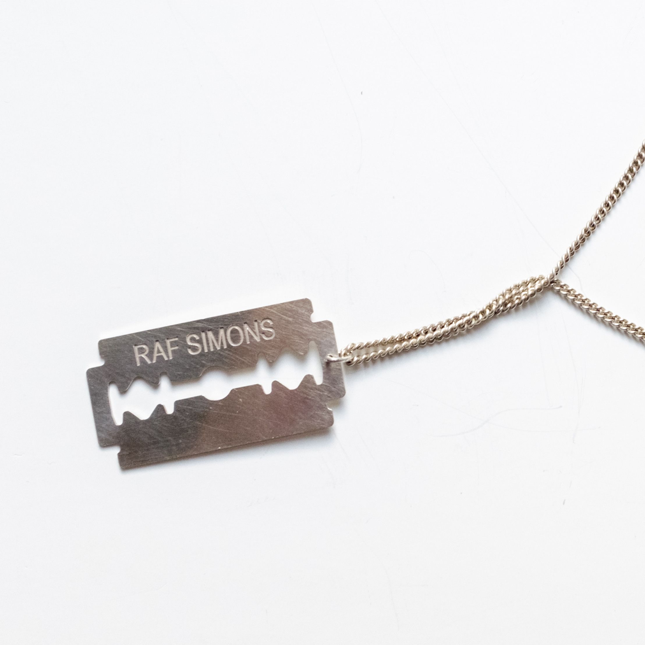 Raf Simons Silver Razor Blade necklace AW 2003/2004 Peter Saville | Grailed