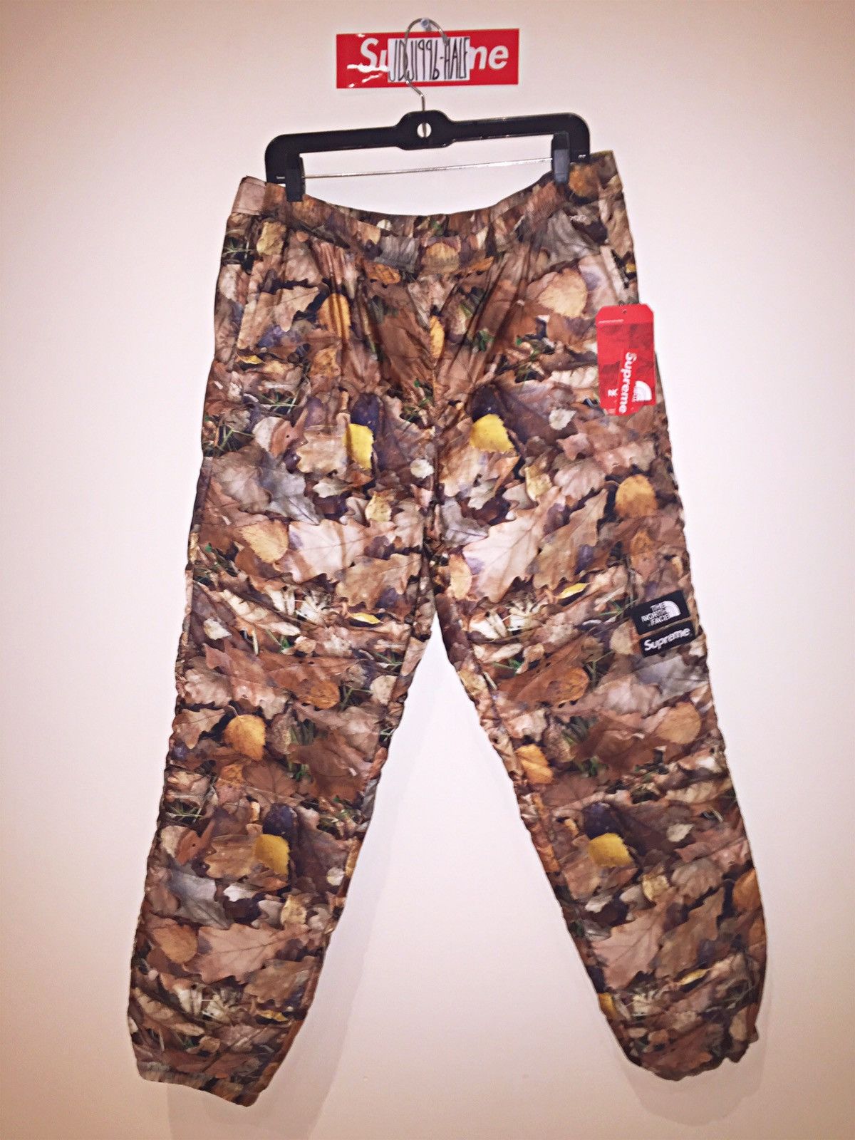 Supreme TNF LEAVES CAMO NUPTSE PANTS, LARGE | Grailed