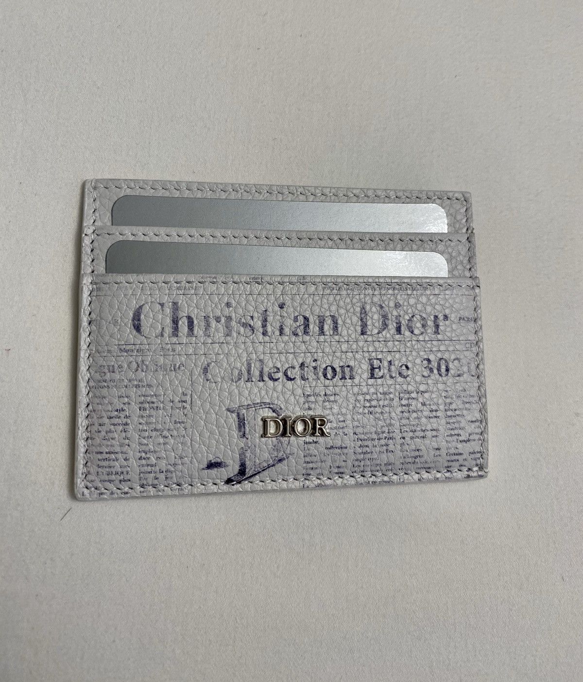 Daniel Arsham × Dior Daniel Arsham Newspaper Print Calfskin Daniel Arsham × Dior Daniel Arsham Newspaper Print Calfskin