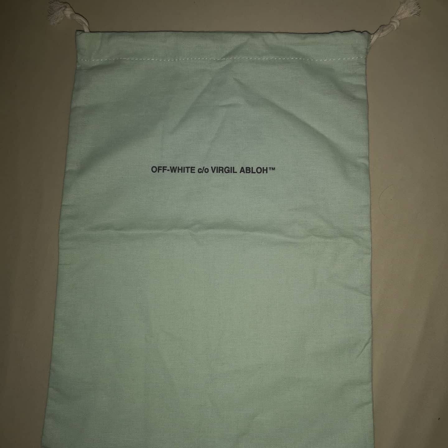 Dust bag off white sales