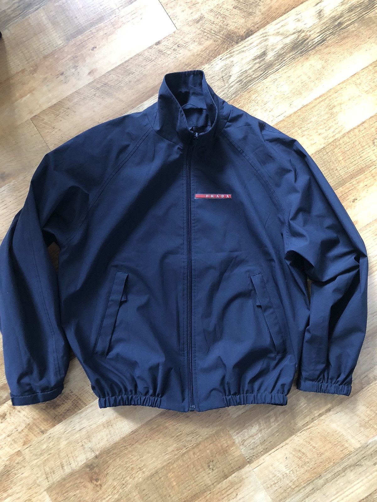 image of Prada Light Zip-Up Jacket in Blue, Men's (Size Small)