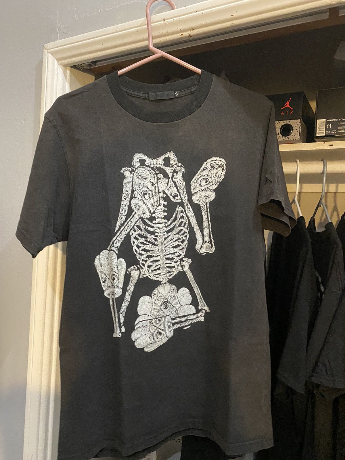 Original Fake Original Fake X Kaws Upside down skeleton T-Shirt | Grailed