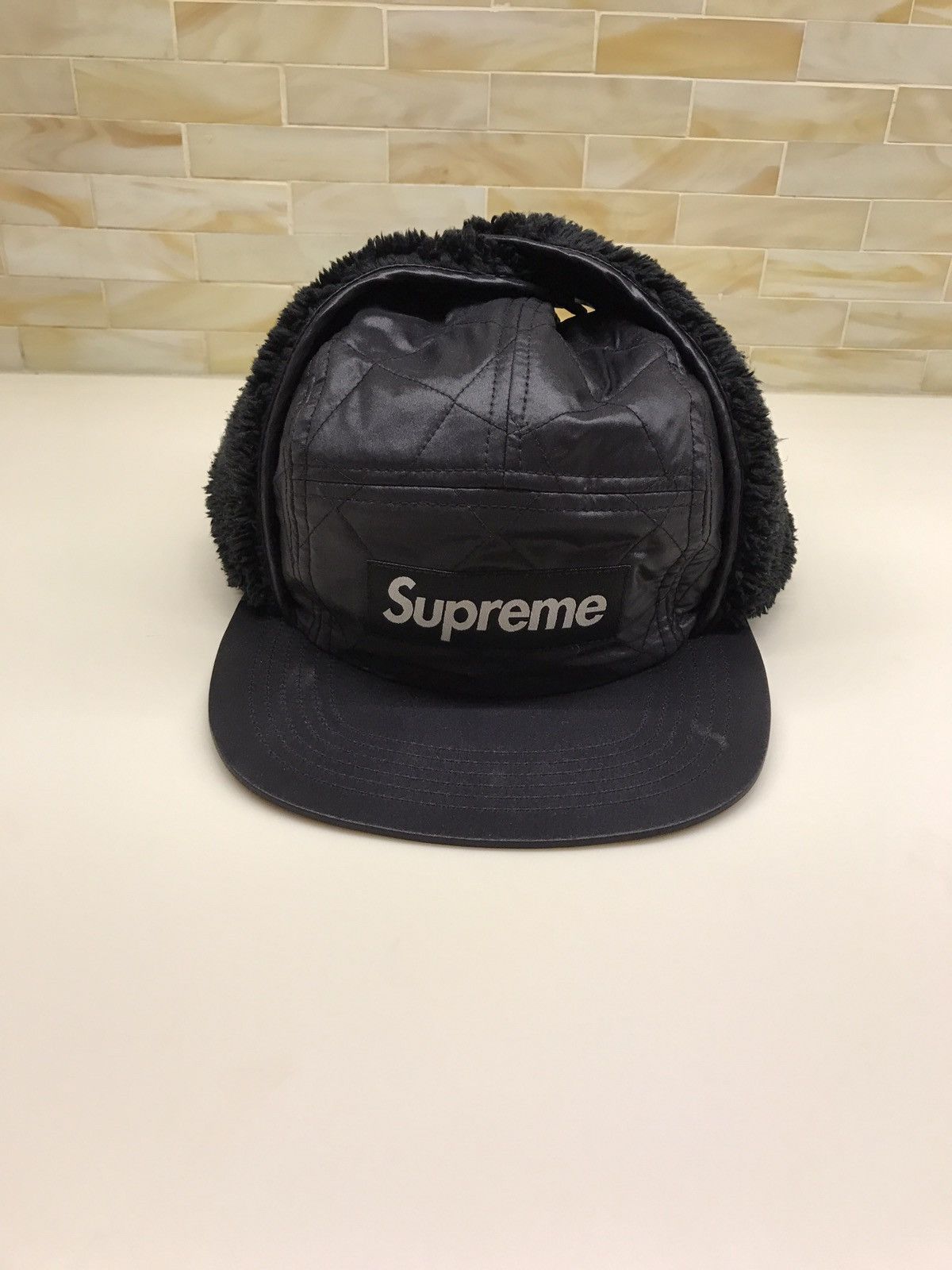 Supreme Quilted Earflap Camp Cap | Grailed