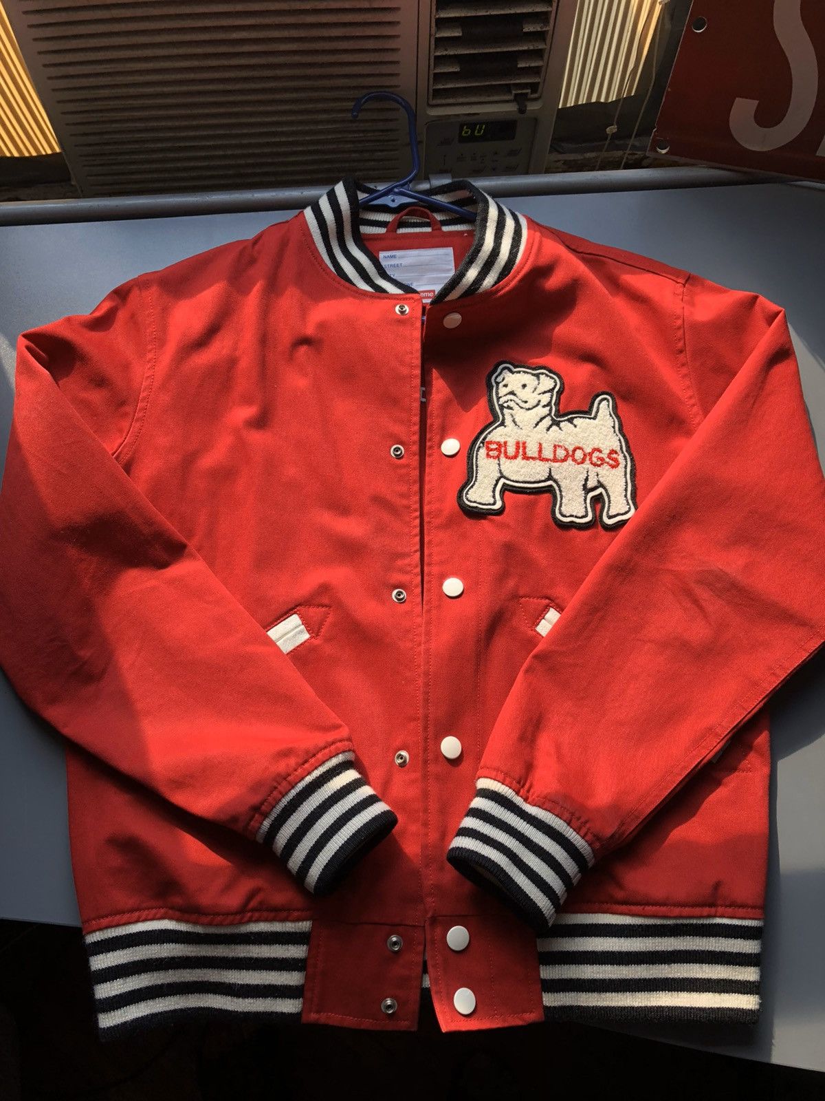 Supreme bulldog varsity jacket deals