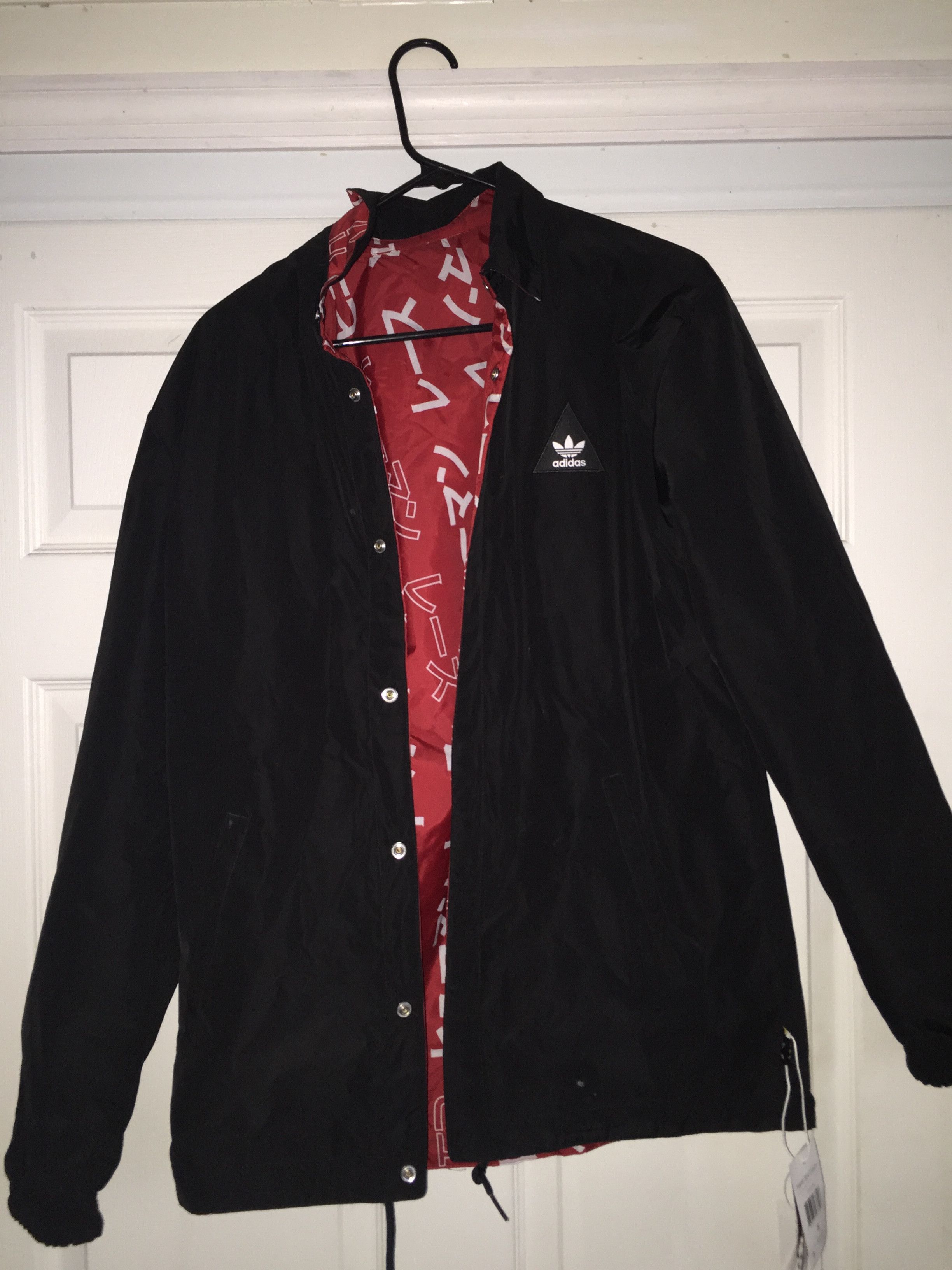 Adidas x pharrell williams coach jacket hotsell