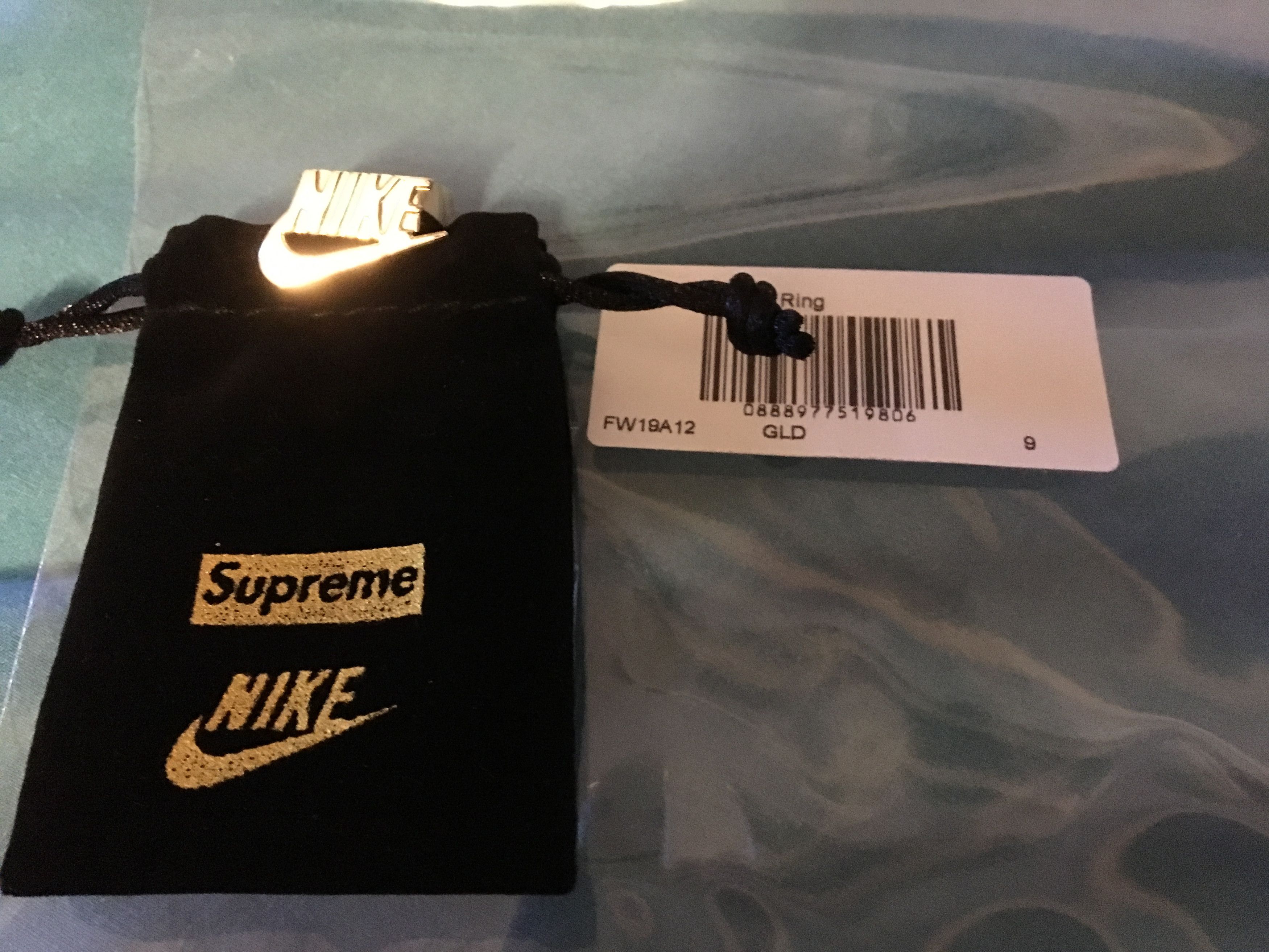 Supreme x best sale nike gold ring