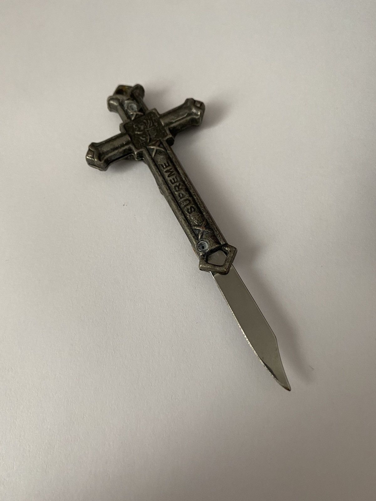 Supreme Supreme Crucifix Cross Knife Keychain Silver 2011 | Grailed