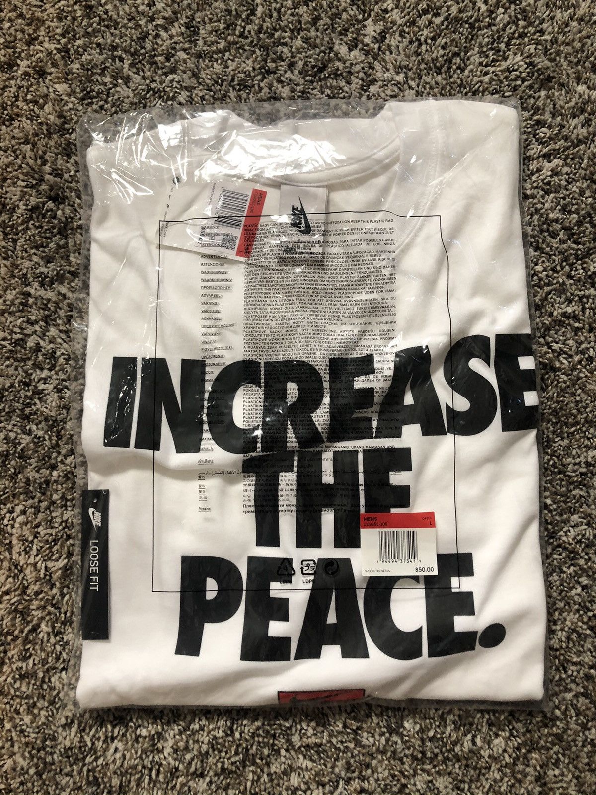 increase the peace stussy nike