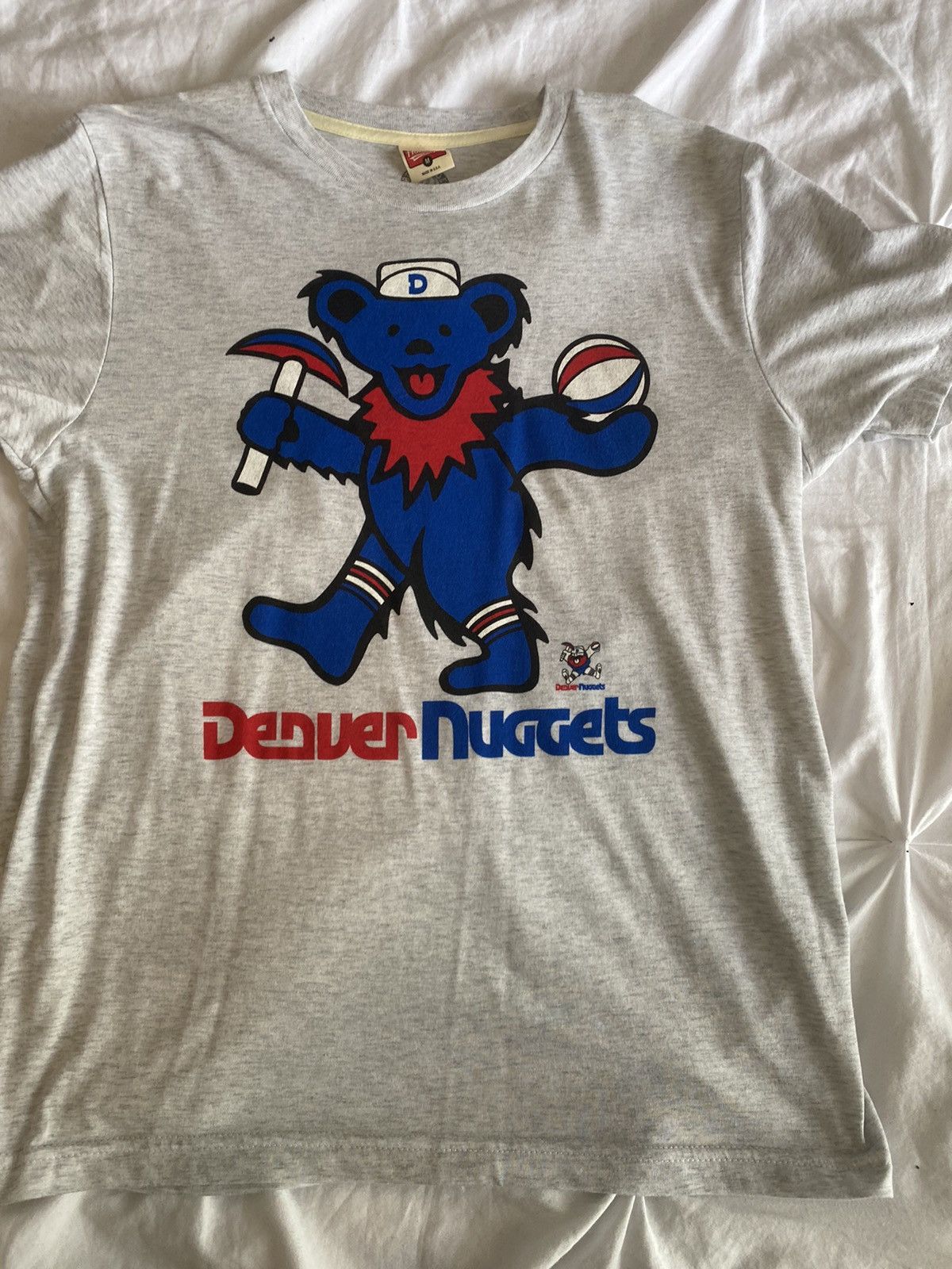 NBA x Grateful Dead x Nuggets Bear T-Shirt from Homage. | Gold | Vintage Apparel from Homage.