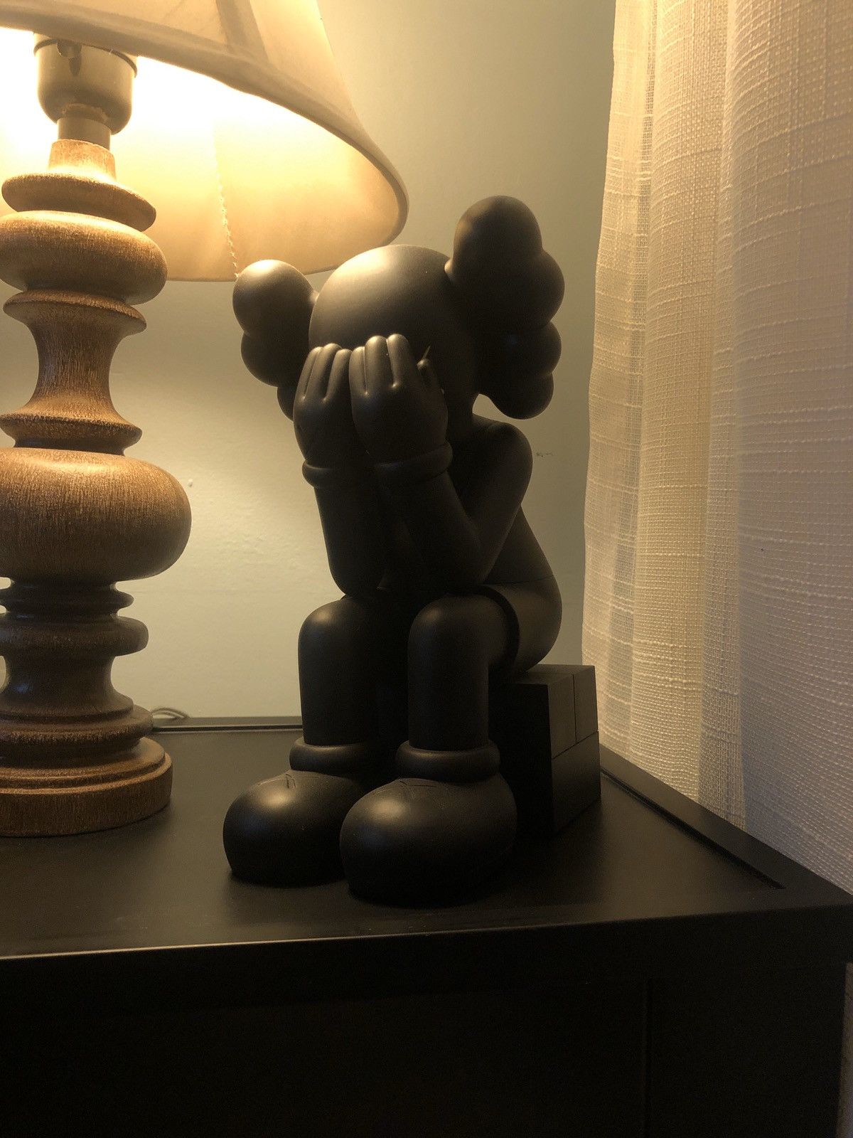 Passing Through Statue