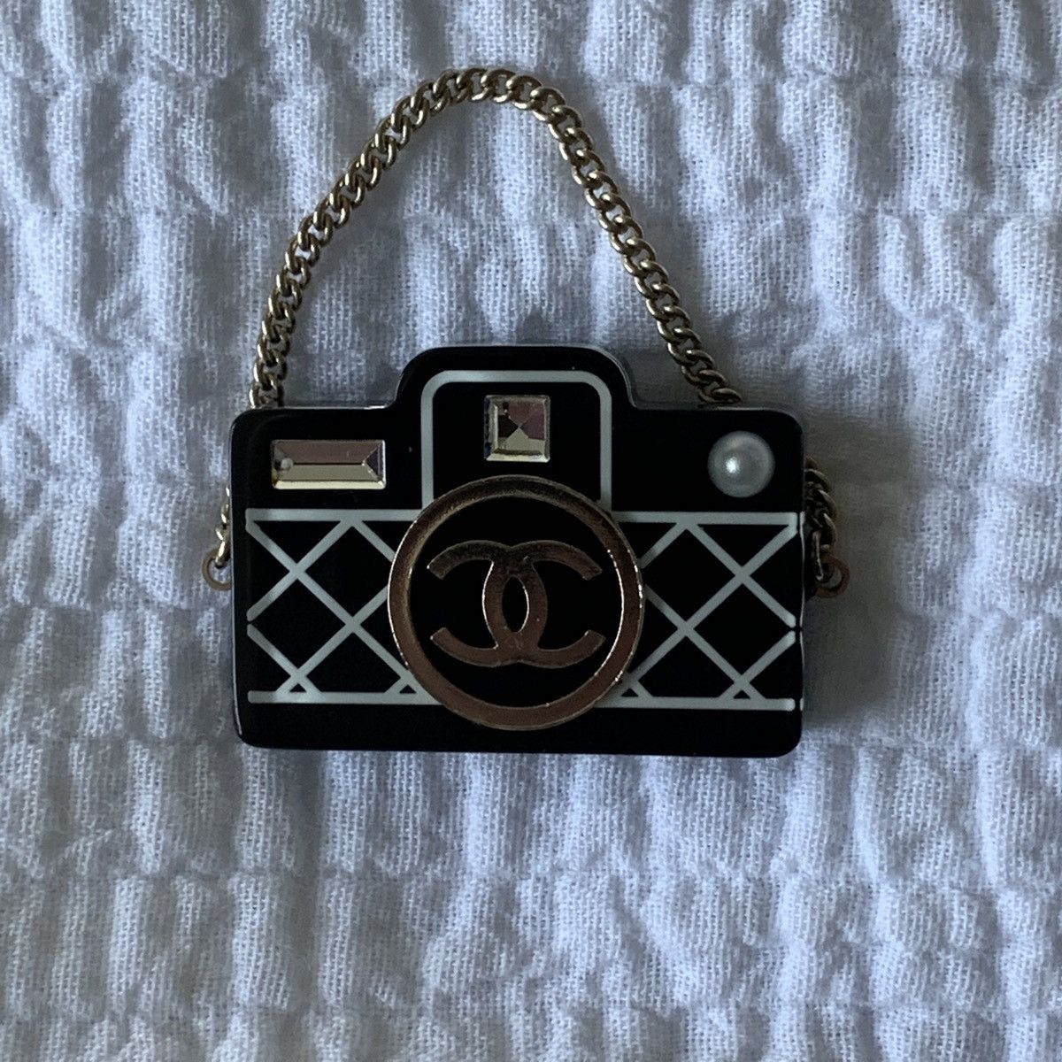 Chanel camera brooch sales