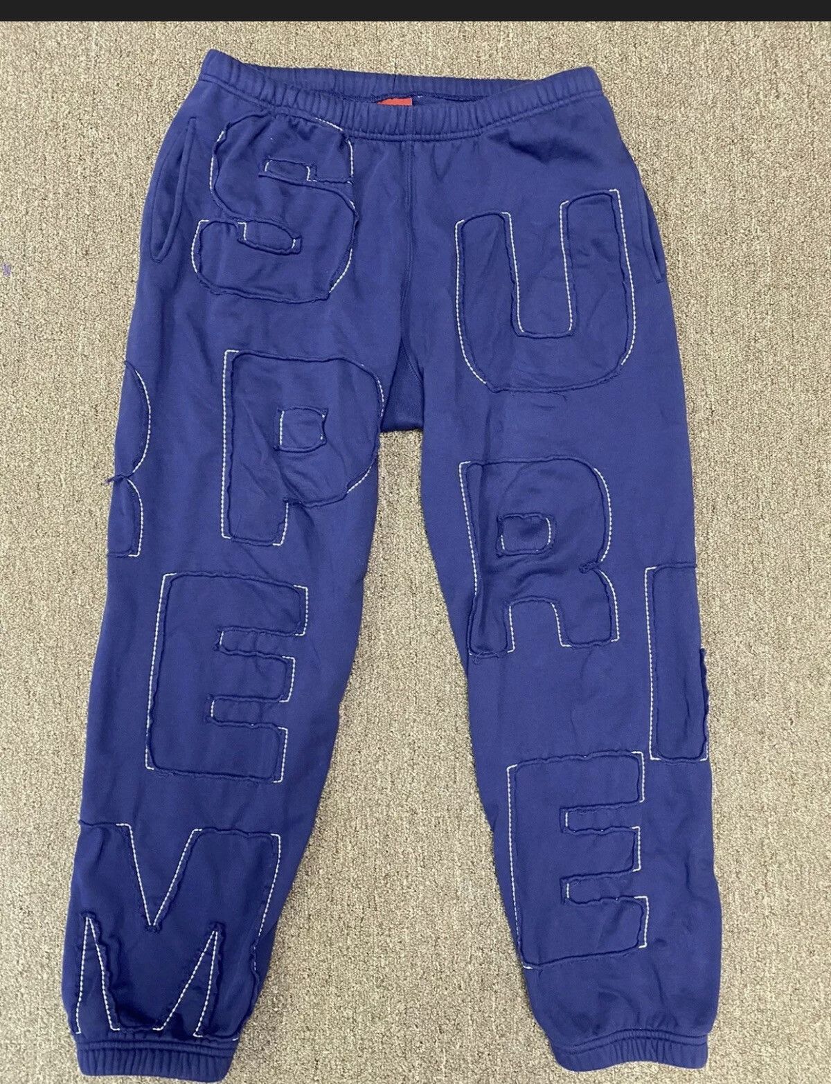 Supreme cutout sale letters sweatpants